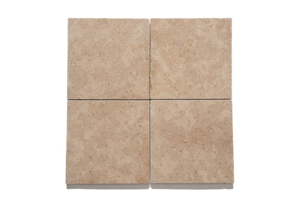 Champagne Taupe limestone field tile, primary product image, 16"×24"×5/8" size. Premium limestone for floors and walls.