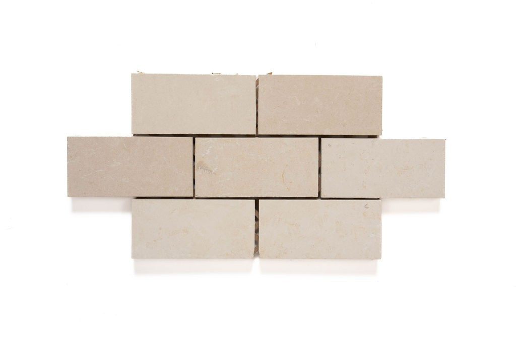Pebble Beach limestone mosaic, top-down product view, 6"×12"×3/8" size. Premium limestone for floors and walls.