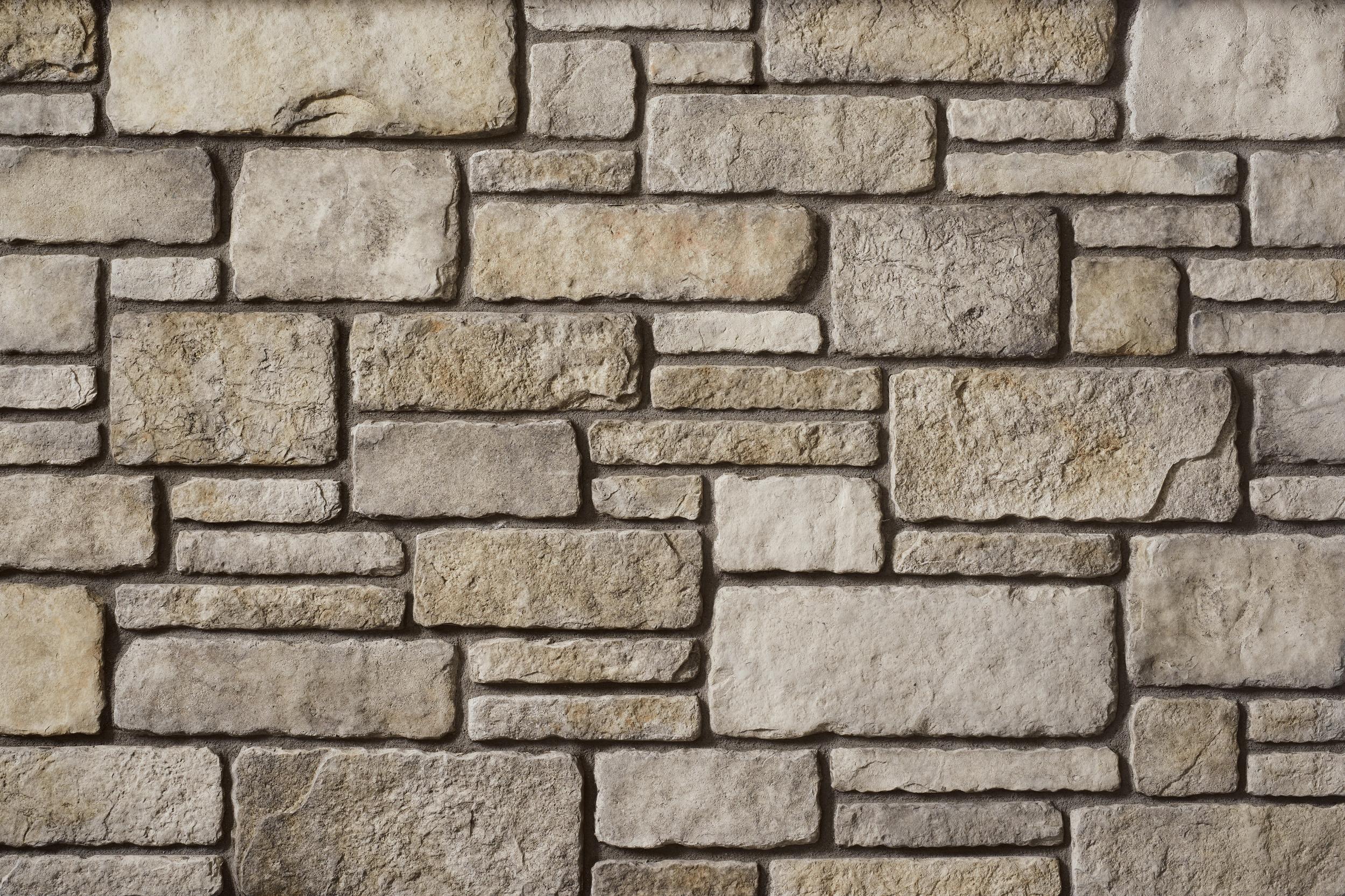 Sculpted Ashlar Grouse wall panels by Cultured Stone, primary product image. Premium stone veneer for exterior and interior walls.