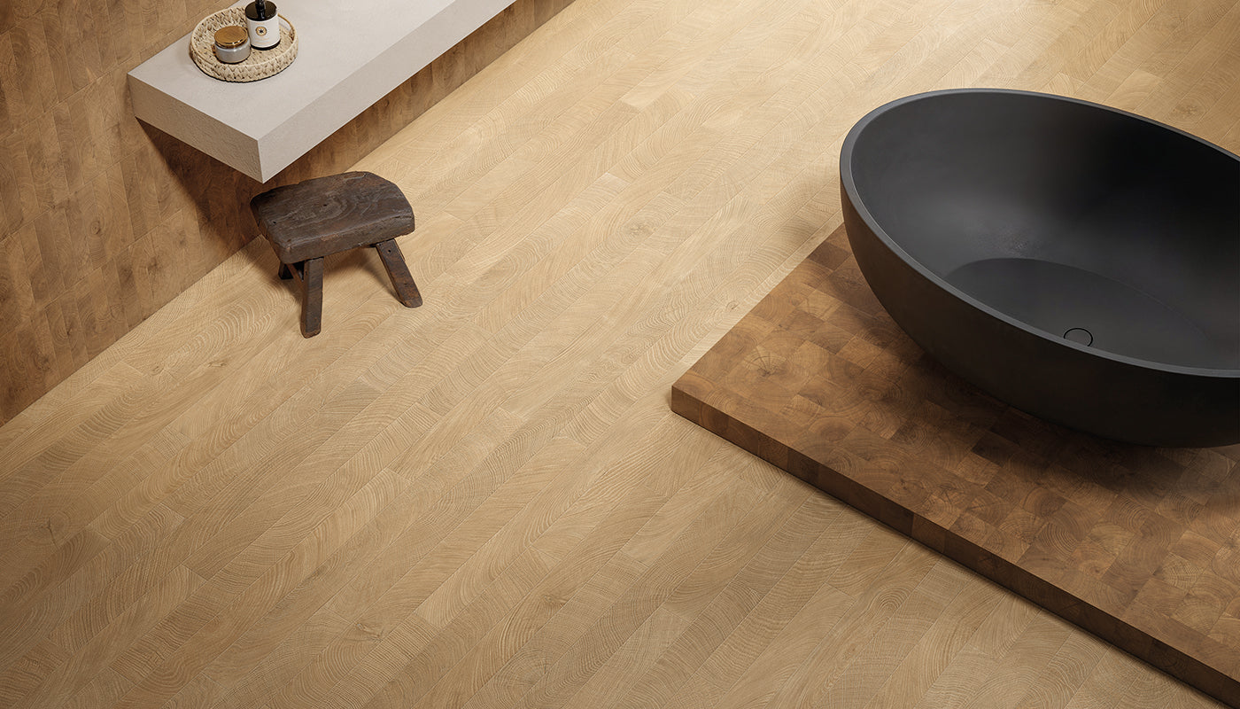 W-Circles Walnut porcelain field tile by Emil, naturale finish, 2 1/8"x11 13/16"x9.5-mm size. Premium Italian porcelain for floors and walls.