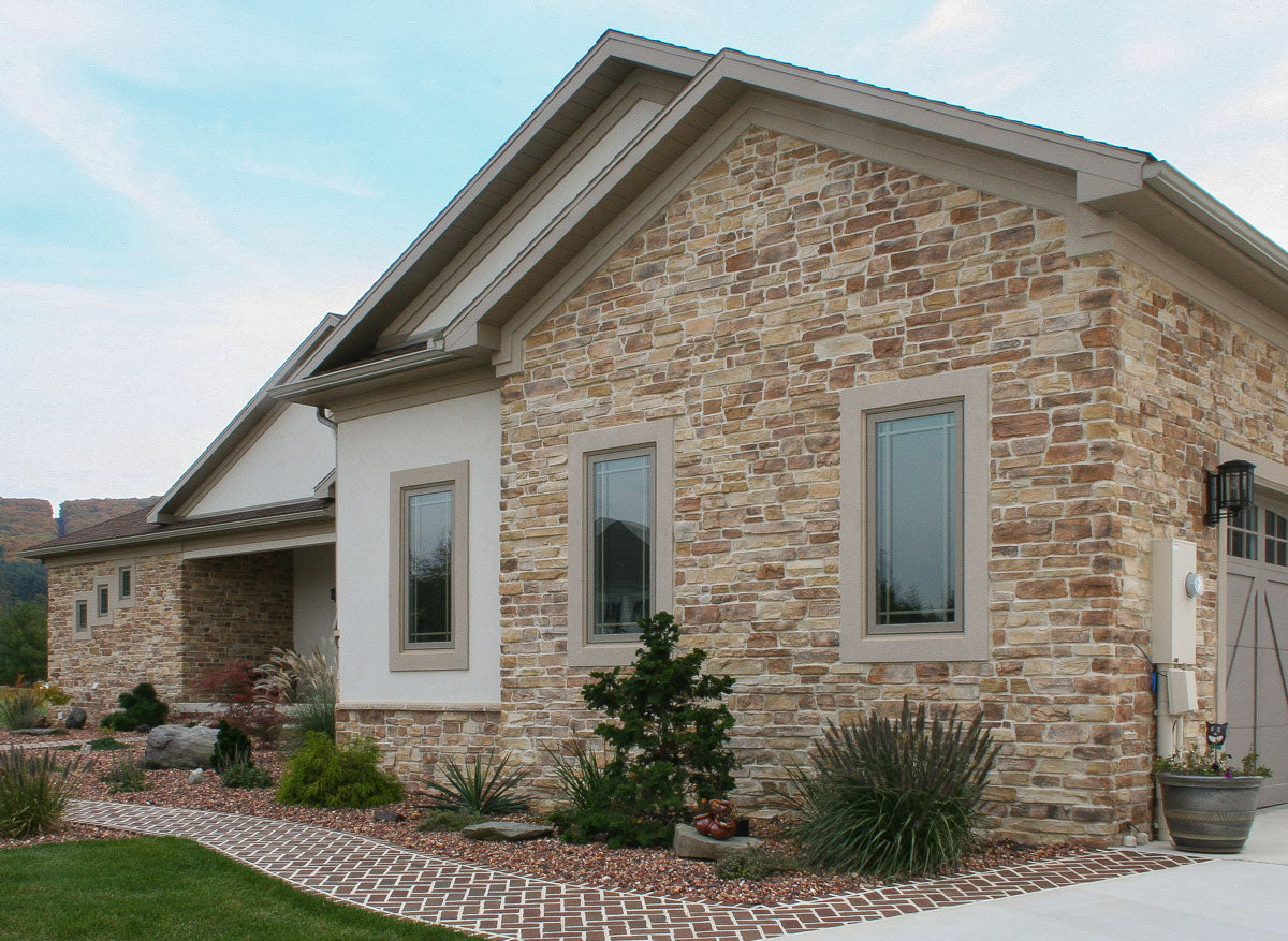 Cliffstone Cambria manufactured stone accessories by Eldorado Stone, lifestyle installation view 2, 1 1/4"–5 1/2"×4"–21 1/4"×5/8"–2 3/8" size. Premium manufactured stone for exterior and interior walls.