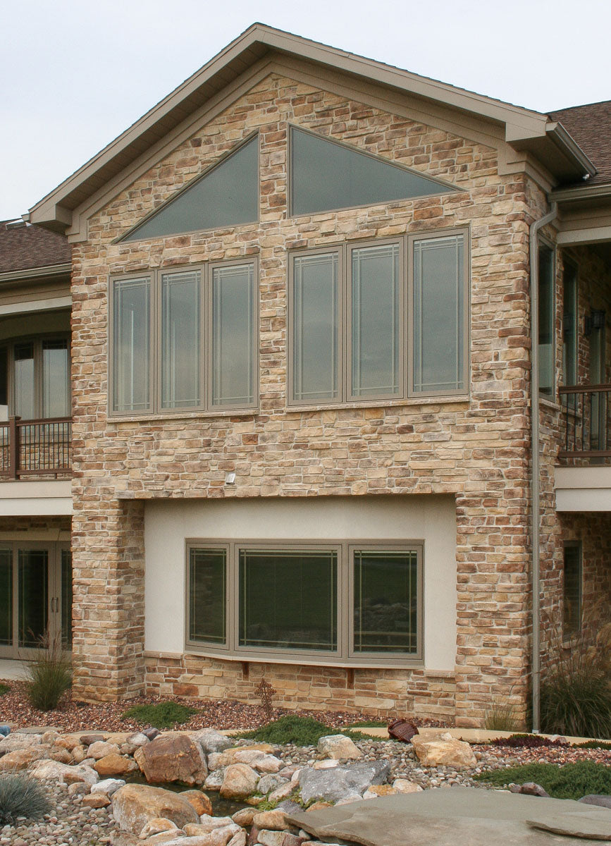 Cliffstone Cambria manufactured stone accessories by Eldorado Stone, lifestyle installation view 3, 1 1/4"–5 1/2"×4"–21 1/4"×5/8"–2 3/8" size. Premium manufactured stone for exterior and interior walls.
