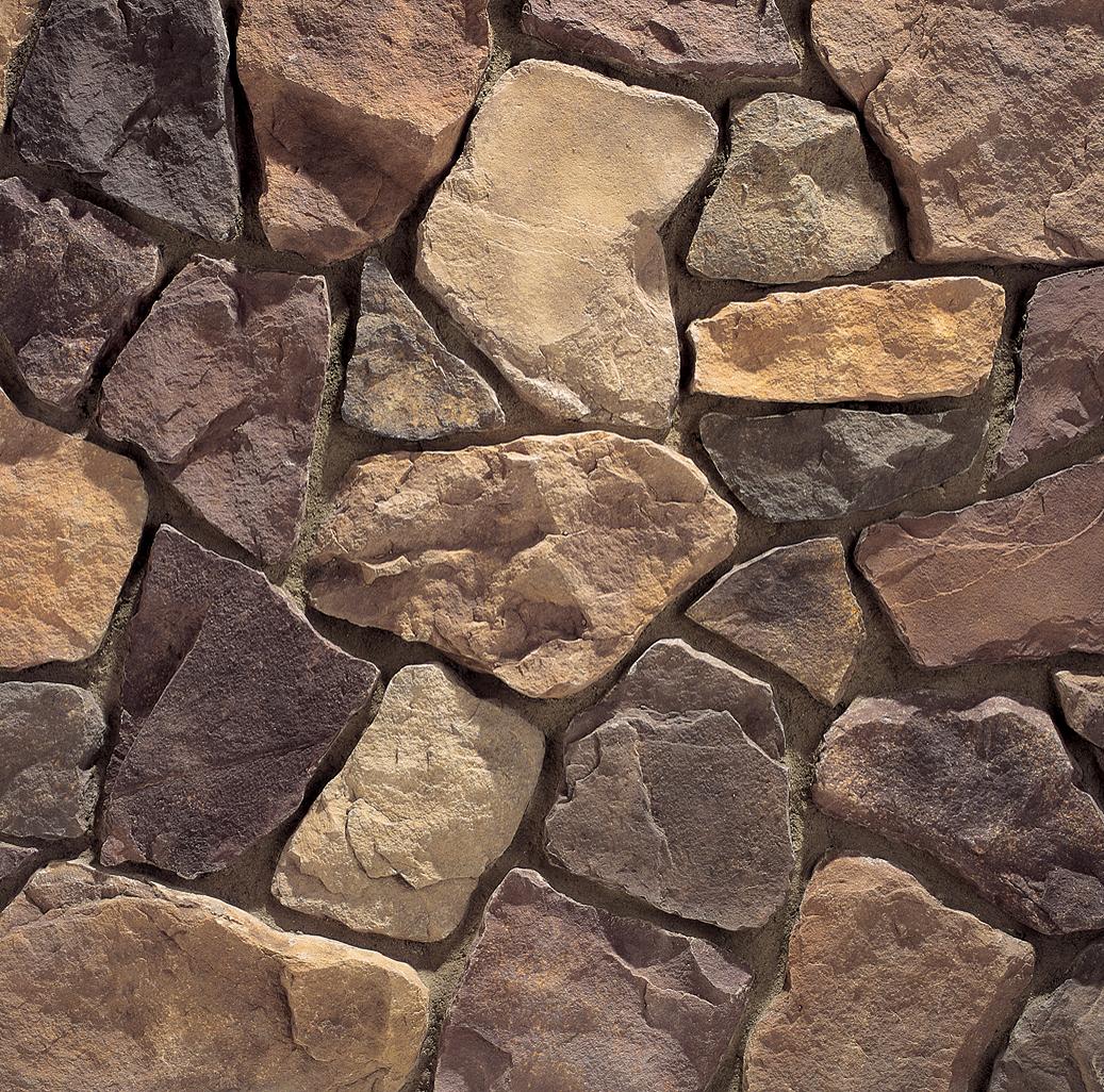 Country Rubble Cognac wall panels by Eldorado Stone, primary product image. Premium stone veneer for exterior and interior walls.