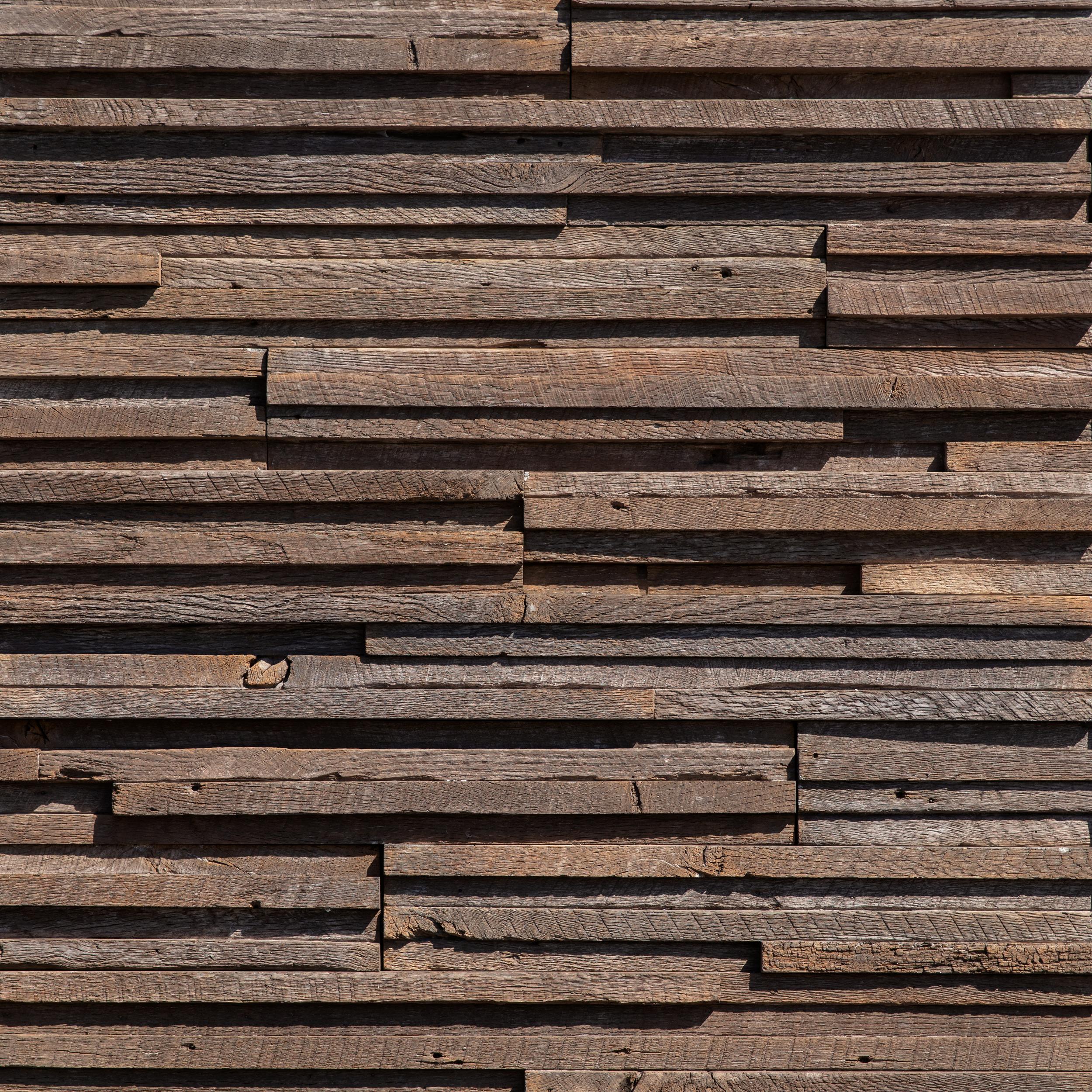 Rivenwood Tawny Brown wall panels by Eldorado Stone, primary product image. Premium stone veneer for exterior and interior walls.