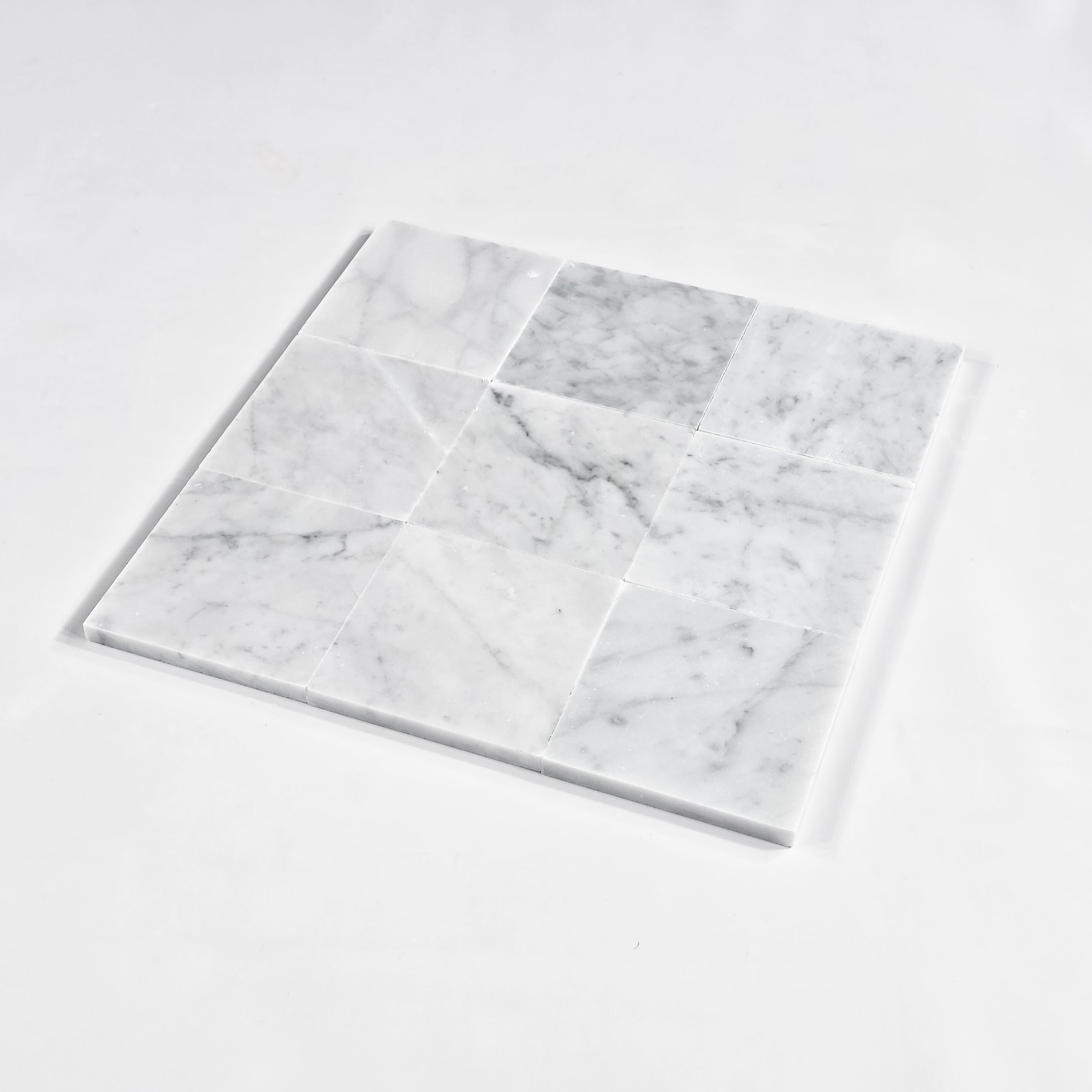 Elon Tile Bianco Carrara Field Tile tile arrangement — available at Surface Group