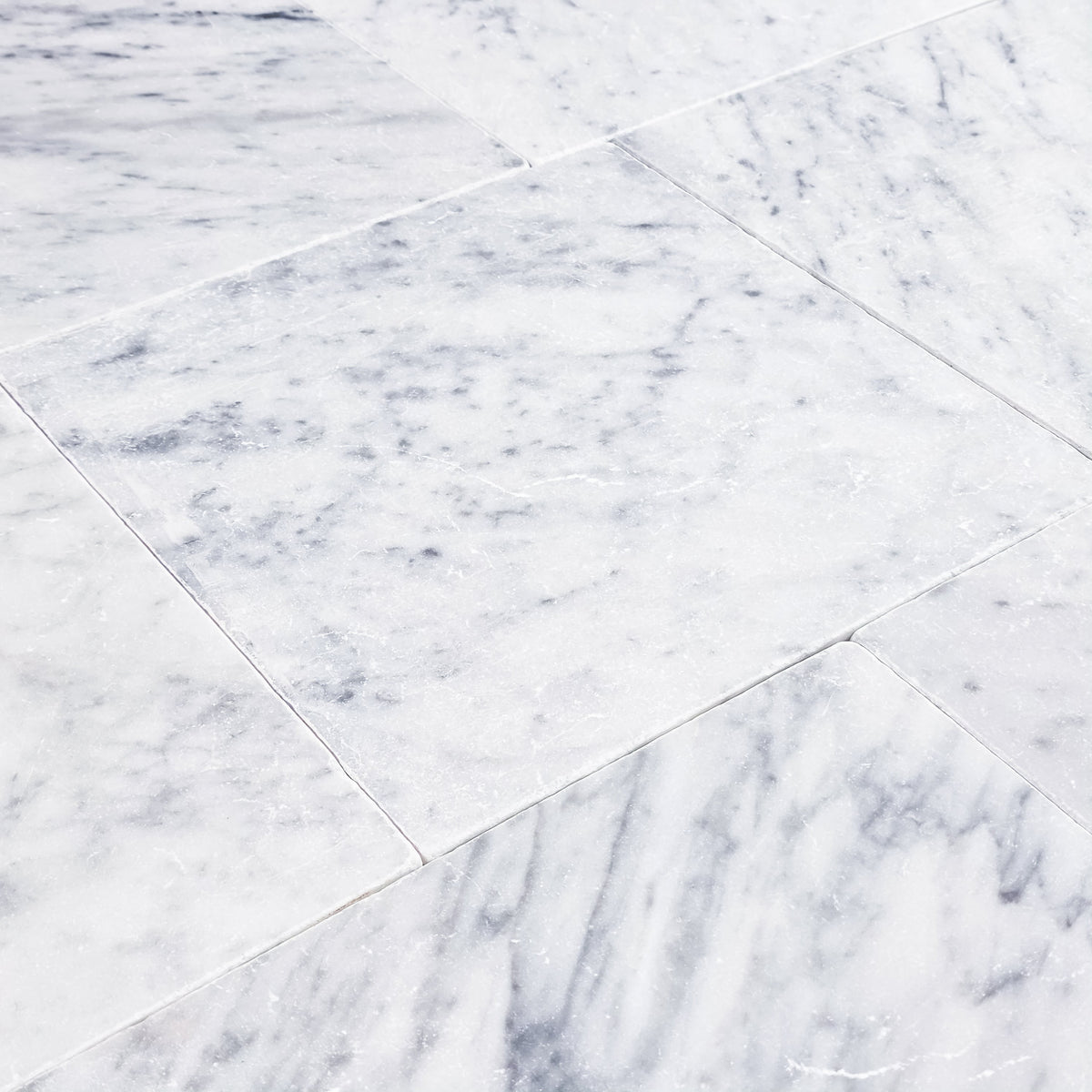 Elon Tile Bianco Carrara Field Tile tile arrangement — available at Surface Group