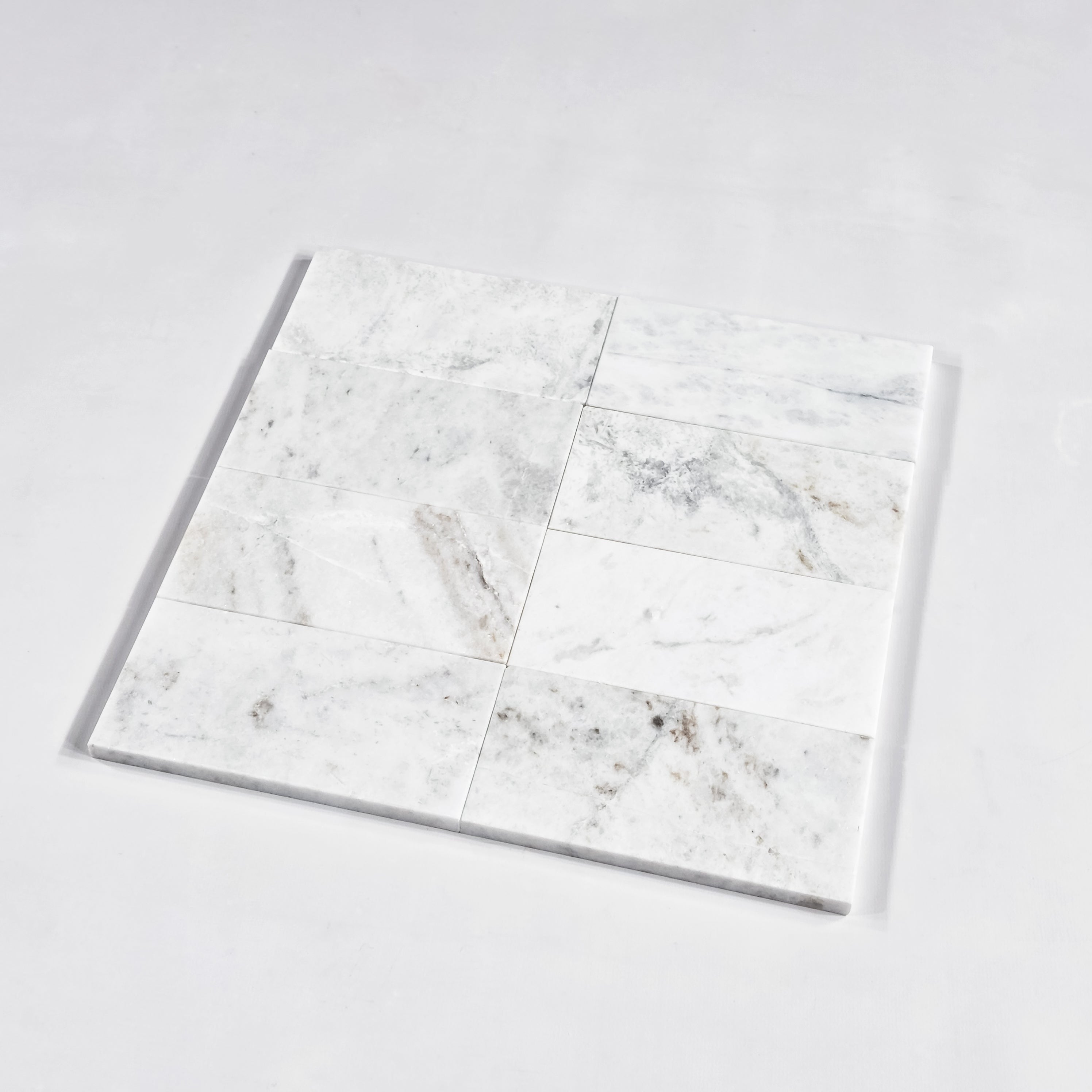 Elon Tile Bianco Oro Field Tile tile arrangement — available at Surface Group
