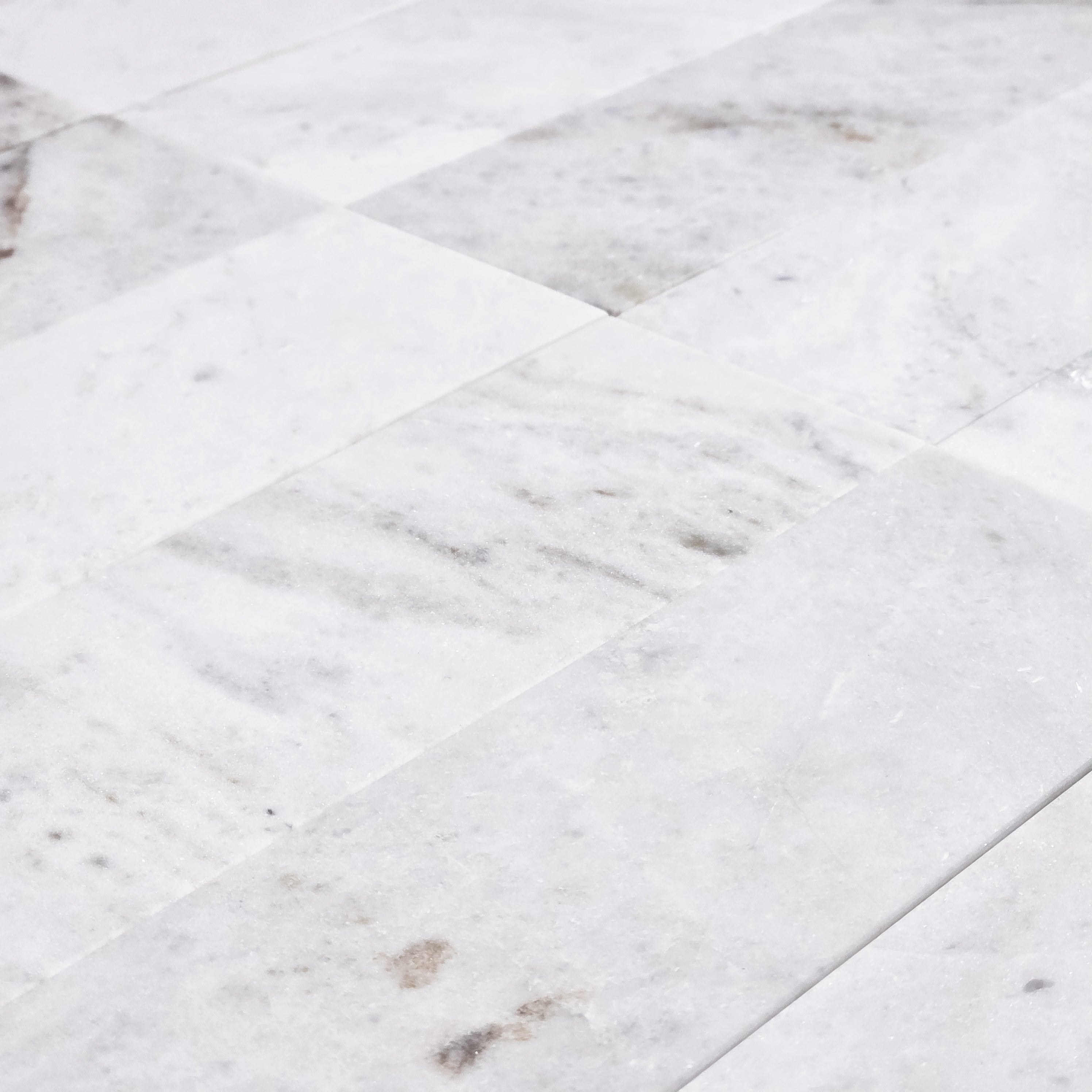 Elon Tile Bianco Oro Field Tile tile arrangement — available at Surface Group