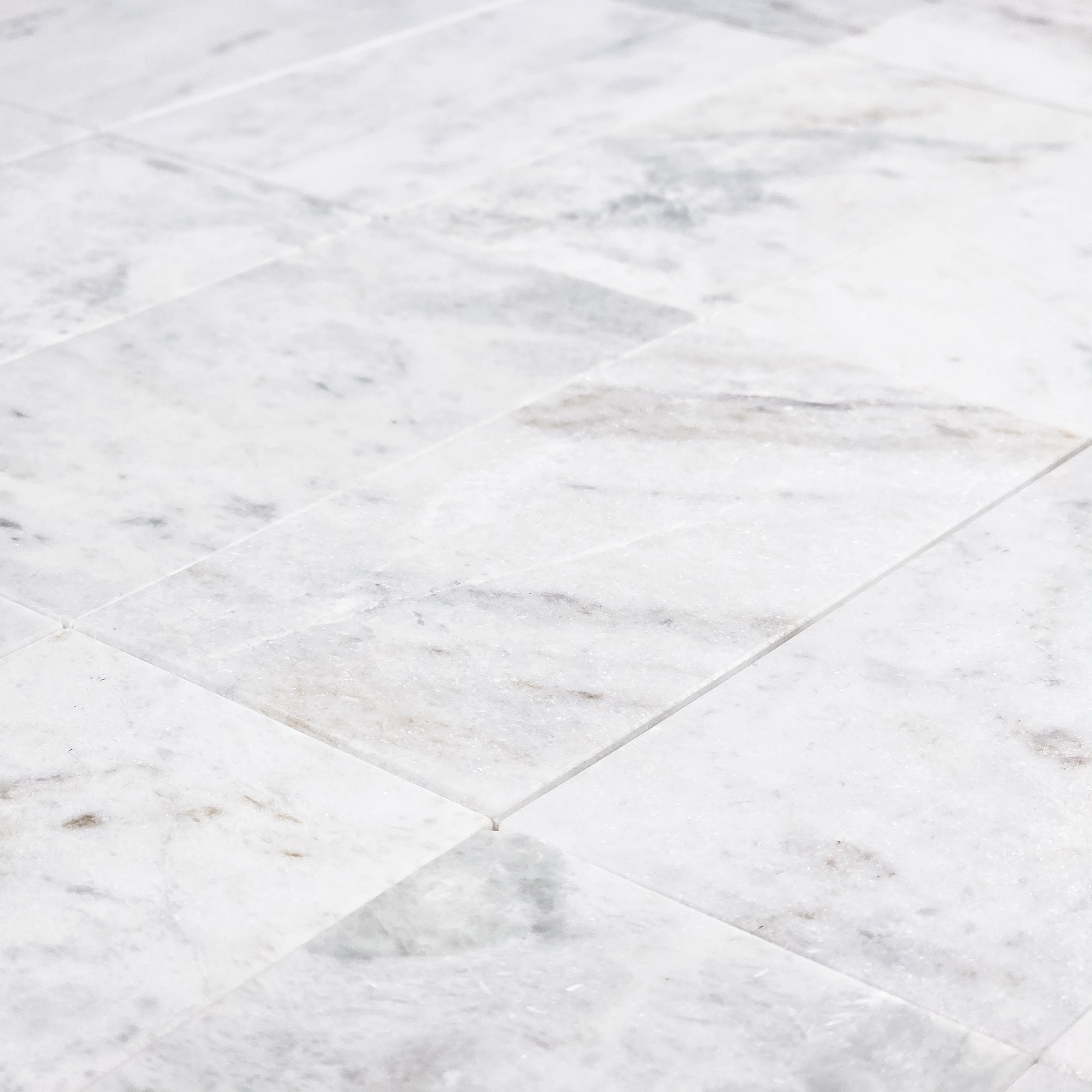 Elon Tile Bianco Oro Field Tile tile arrangement — available at Surface Group