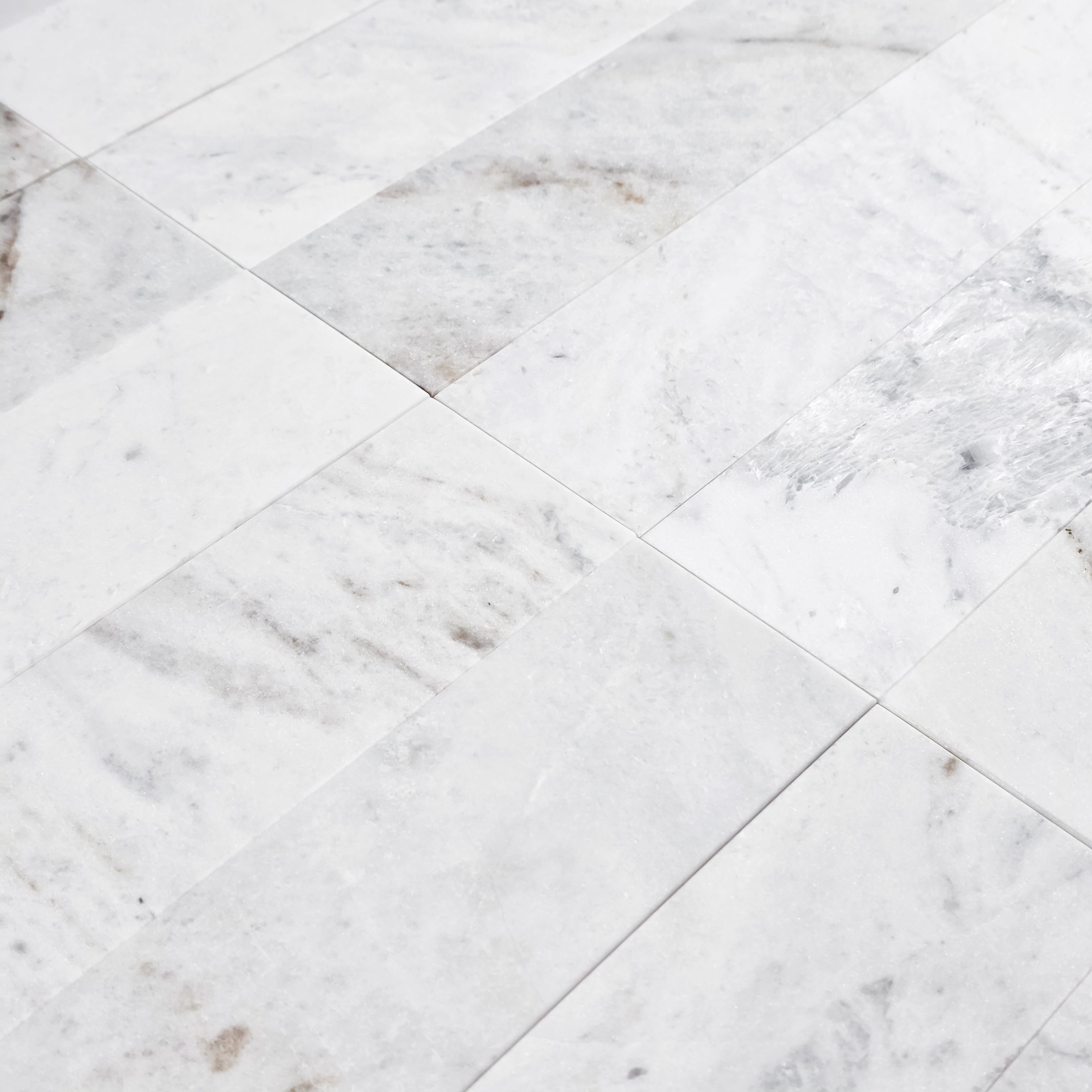 Elon Tile Bianco Oro Field Tile tile arrangement — available at Surface Group