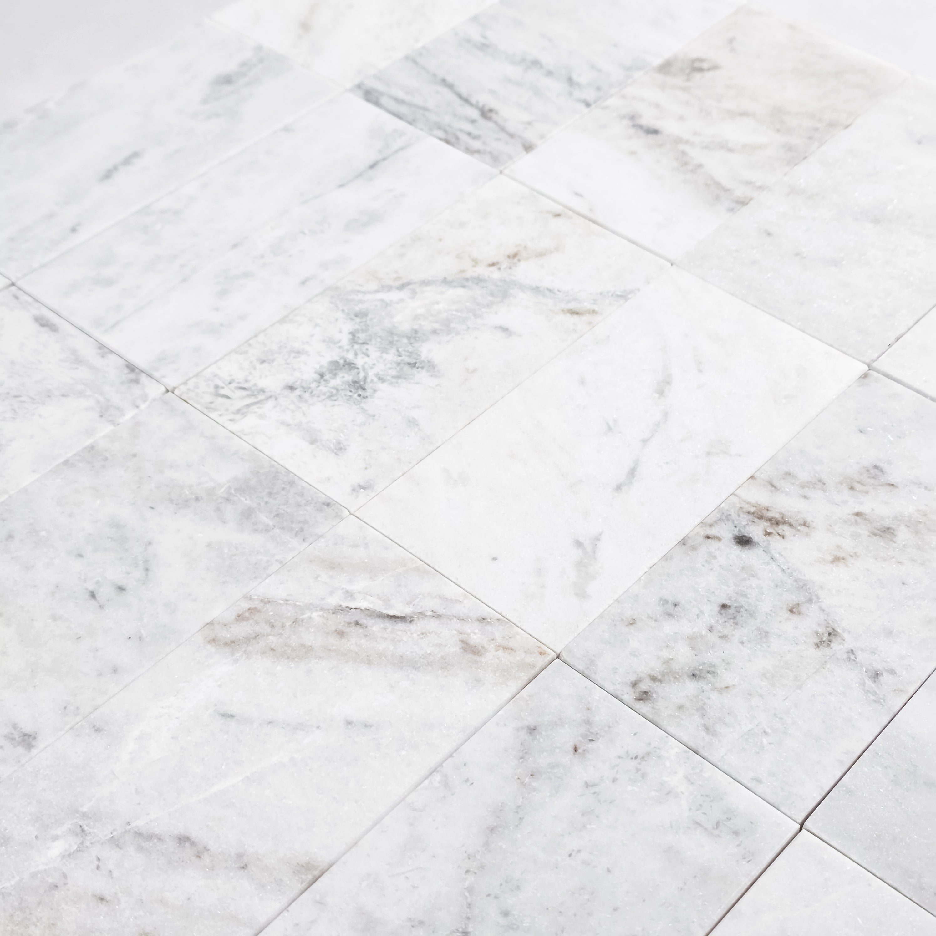 Elon Tile Bianco Oro Field Tile tile arrangement — available at Surface Group