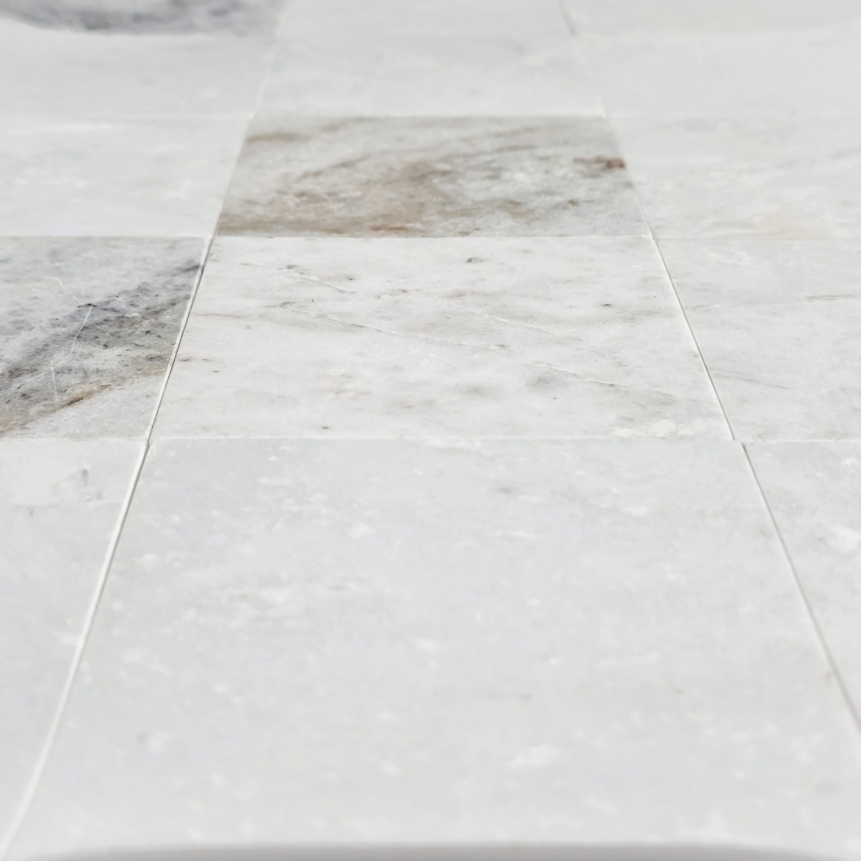 Elon Tile Bianco Oro Field Tile tile arrangement — available at Surface Group