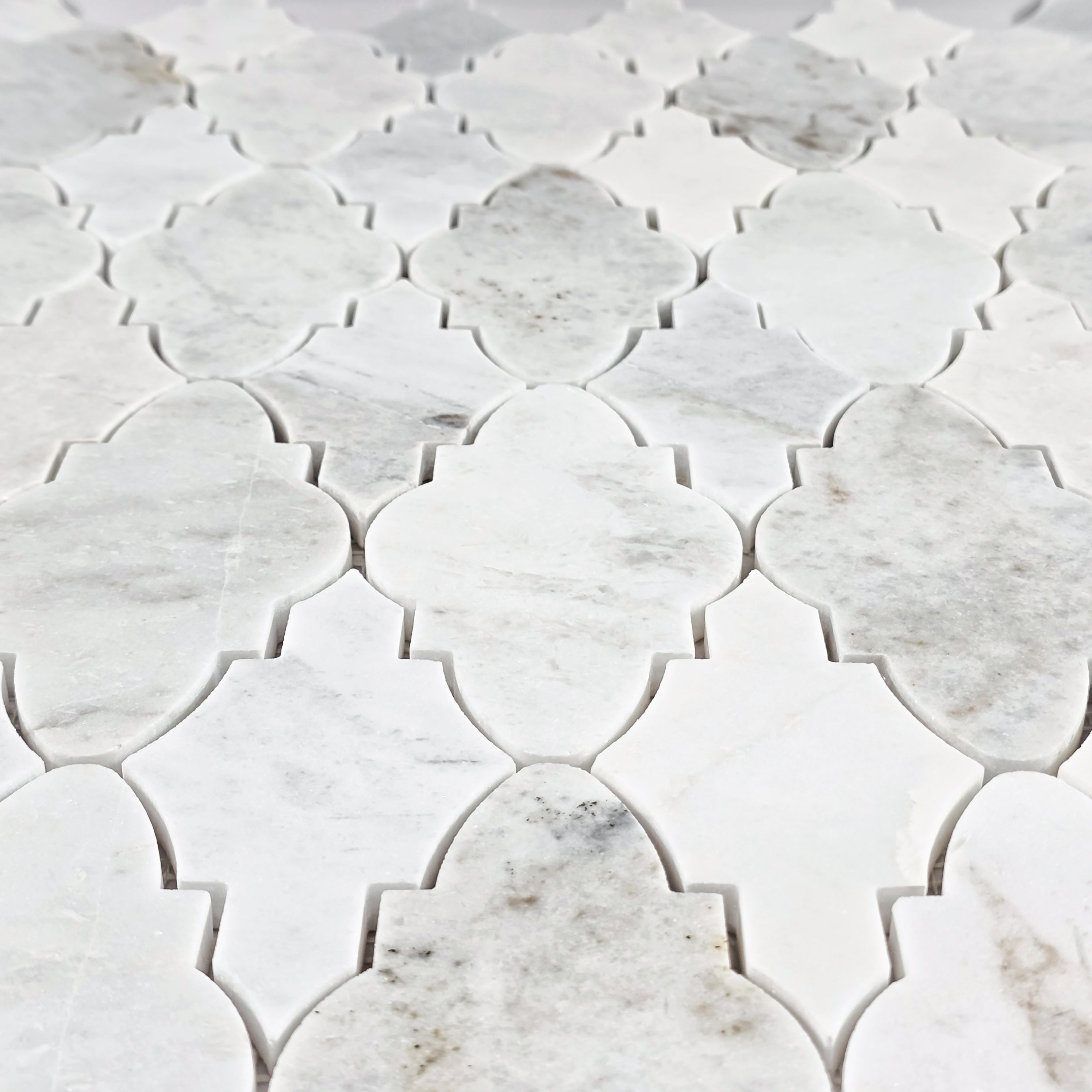 Elon Tile Bianco Oro Mosaic tile arrangement — available at Surface Group