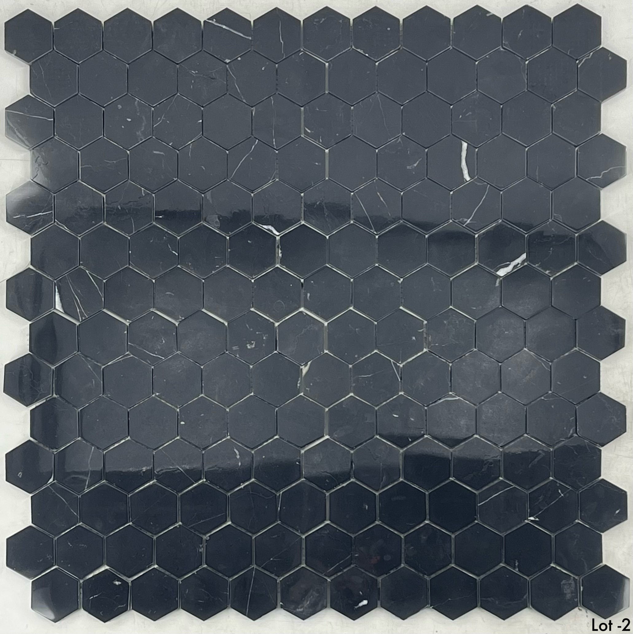 Elon Tile Hexagon tile — available at Surface Group