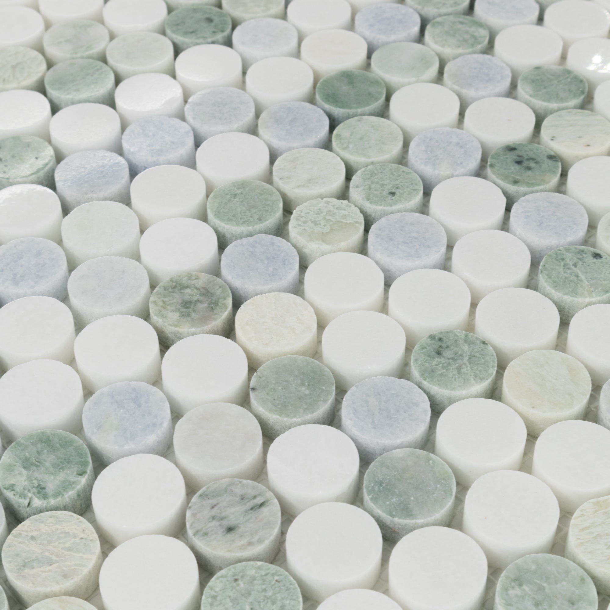 Elon Tile Rounds tile arrangement — available at Surface Group
