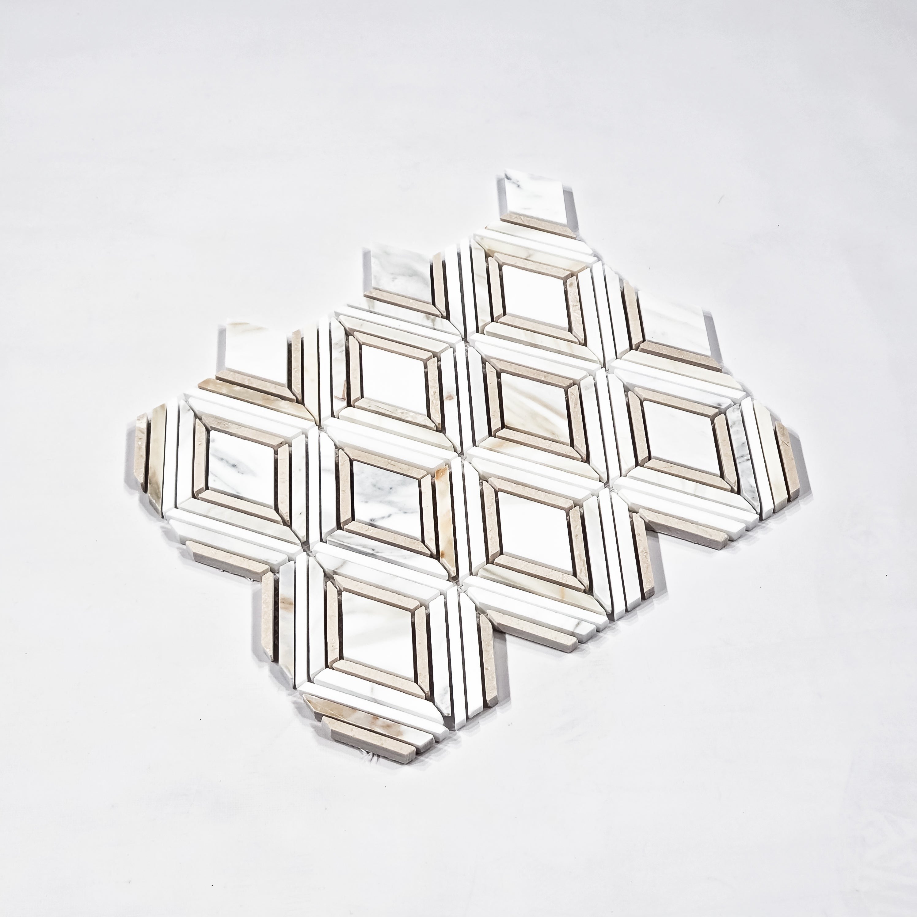 Elon Tile Calacatta Gold Mosaic tile close-up view — available at Surface Group