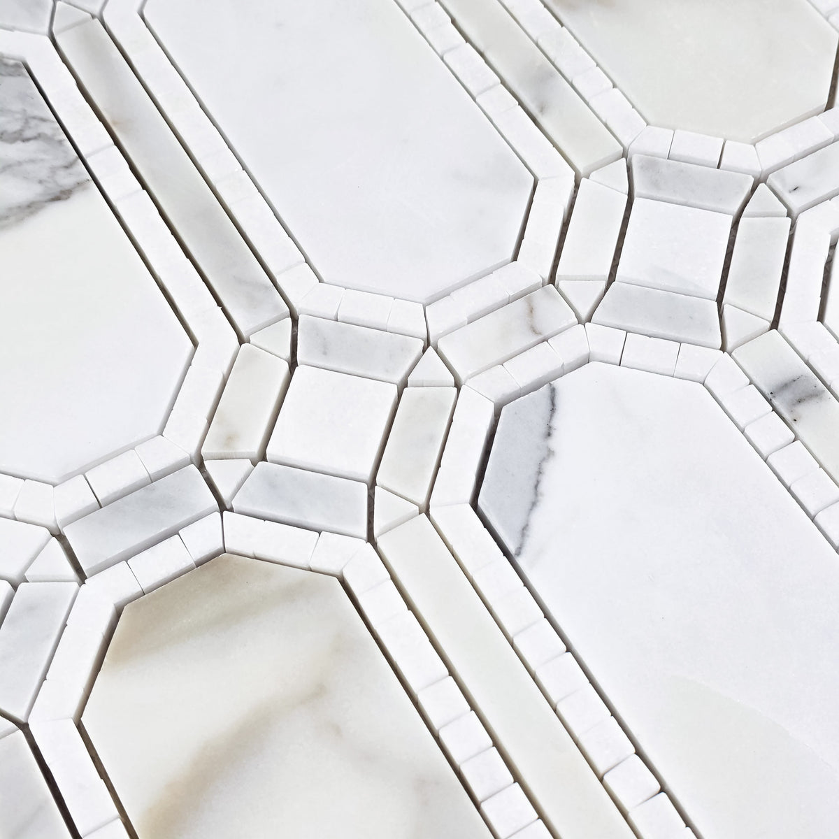 Elon Tile Calacatta Gold Mosaic tile arrangement — available at Surface Group