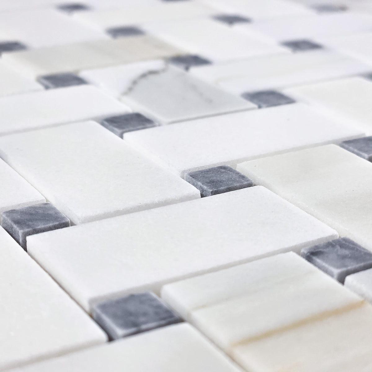 Elon Tile Herringbone tile arrangement — available at Surface Group