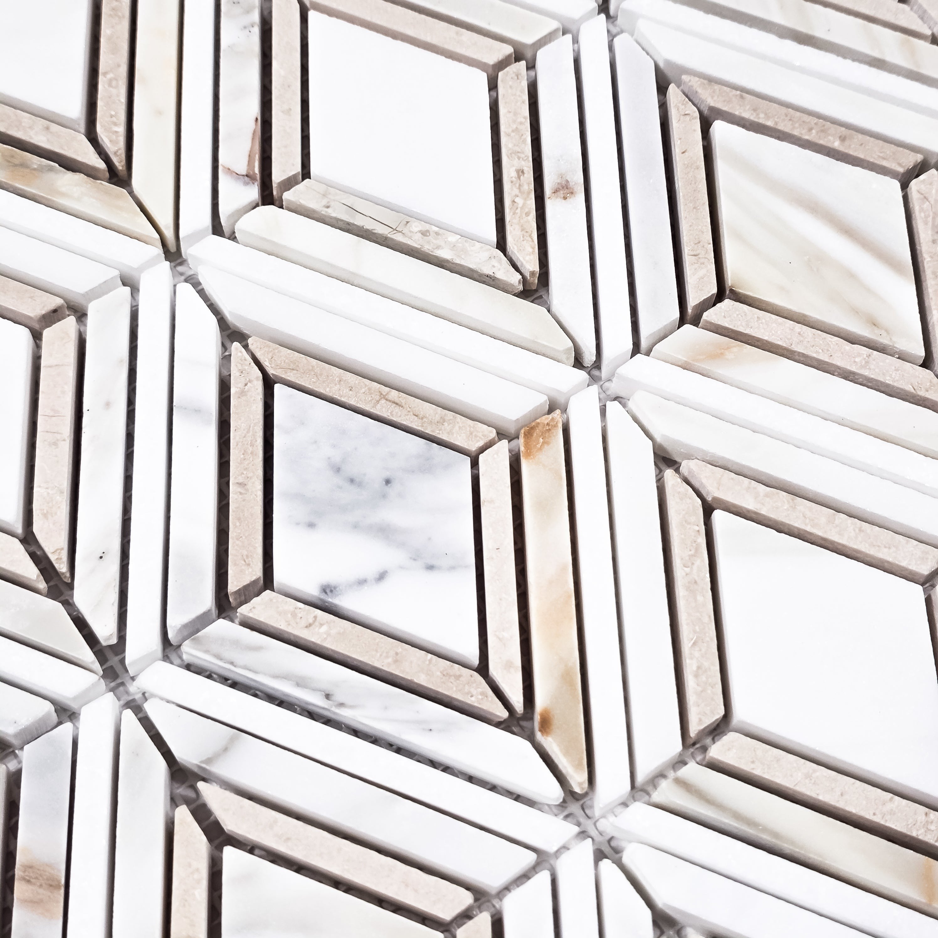 Elon Tile Calacatta Gold Mosaic tile arrangement — available at Surface Group