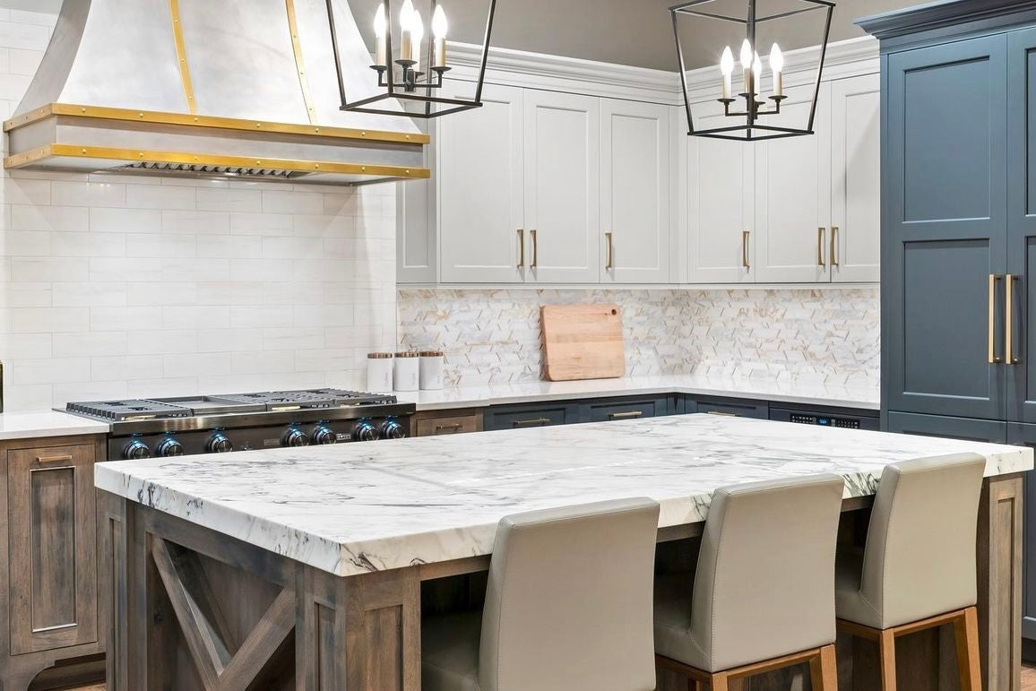 Elon Tile Calacatta Gold Mosaic tile in a room setting — available at Surface Group