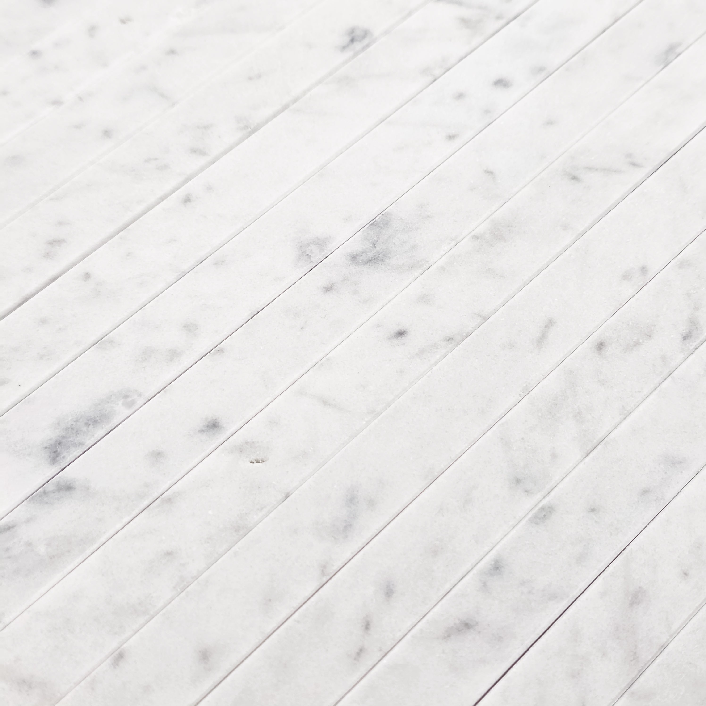 Elon Tile Flat Liner tile arrangement — available at Surface Group