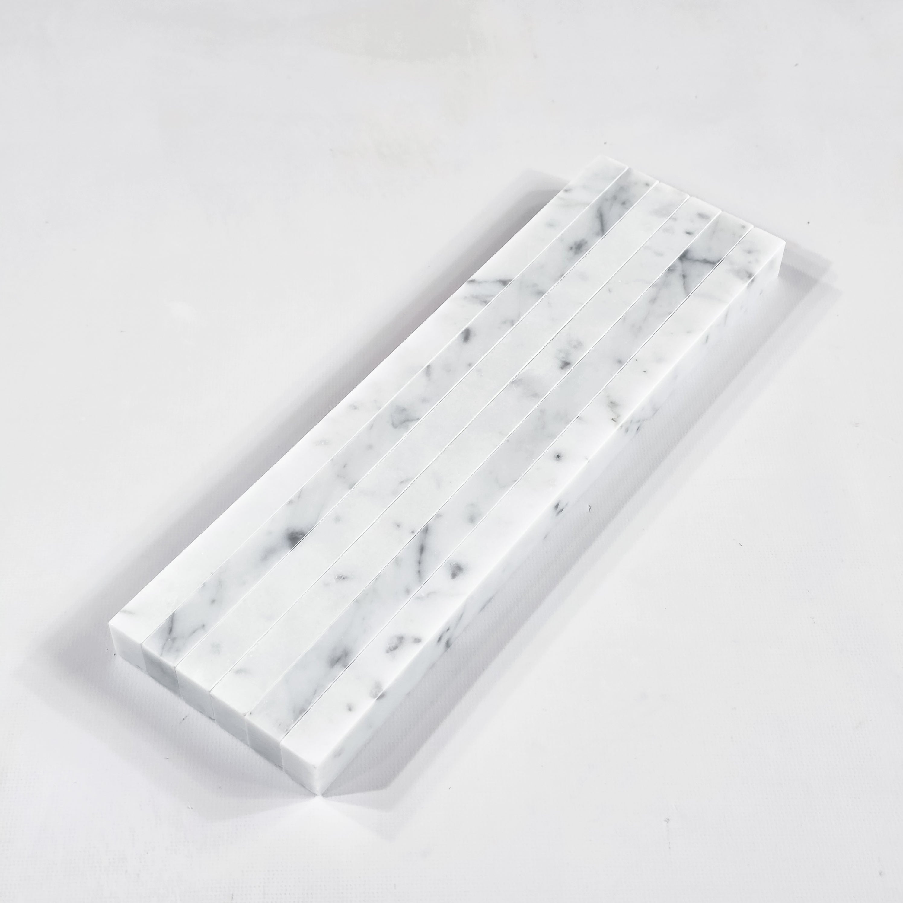 Elon Tile Flat Liner tile close-up view — available at Surface Group