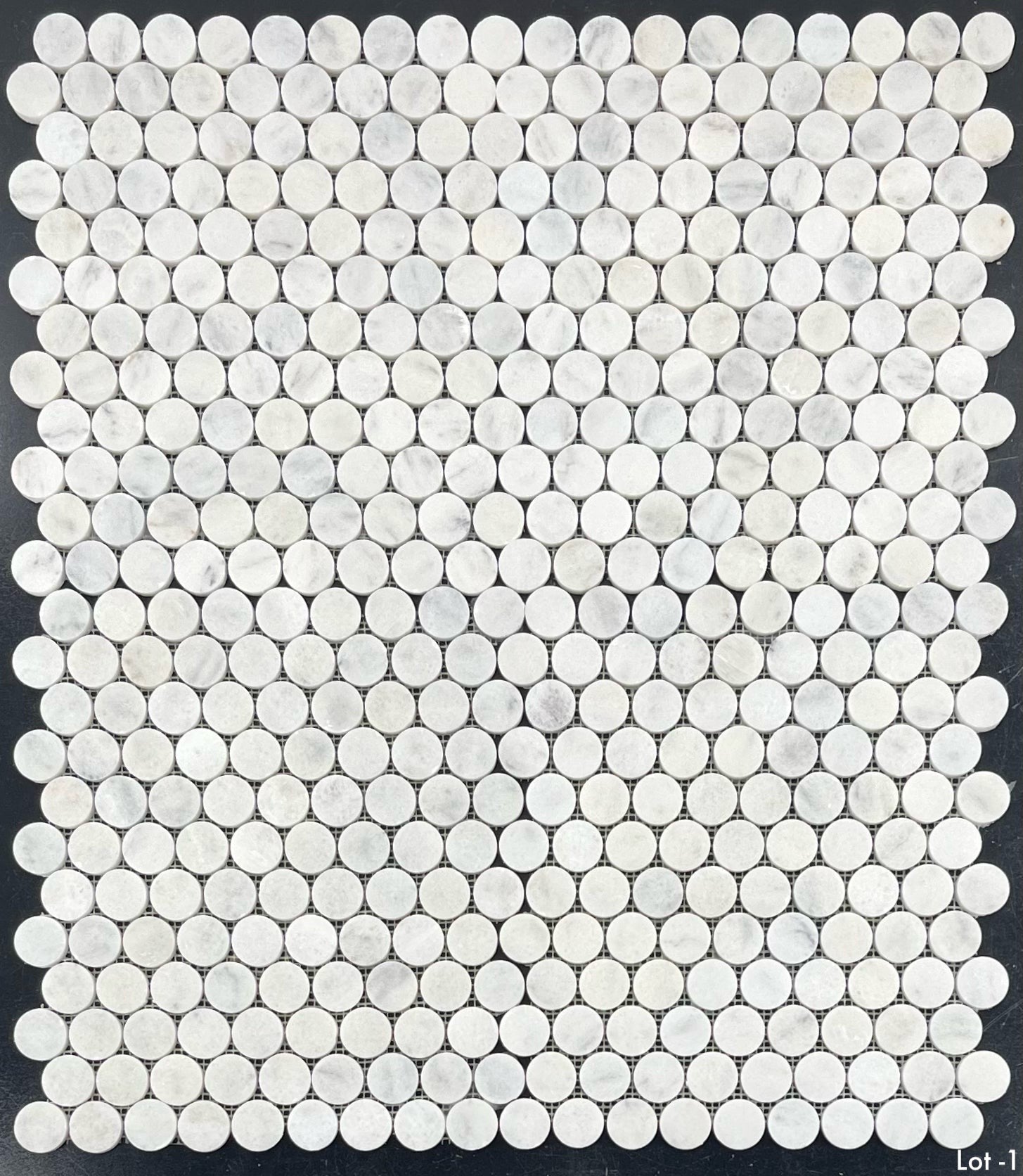 Elon Tile Rounds tile pattern swatch — available at Surface Group