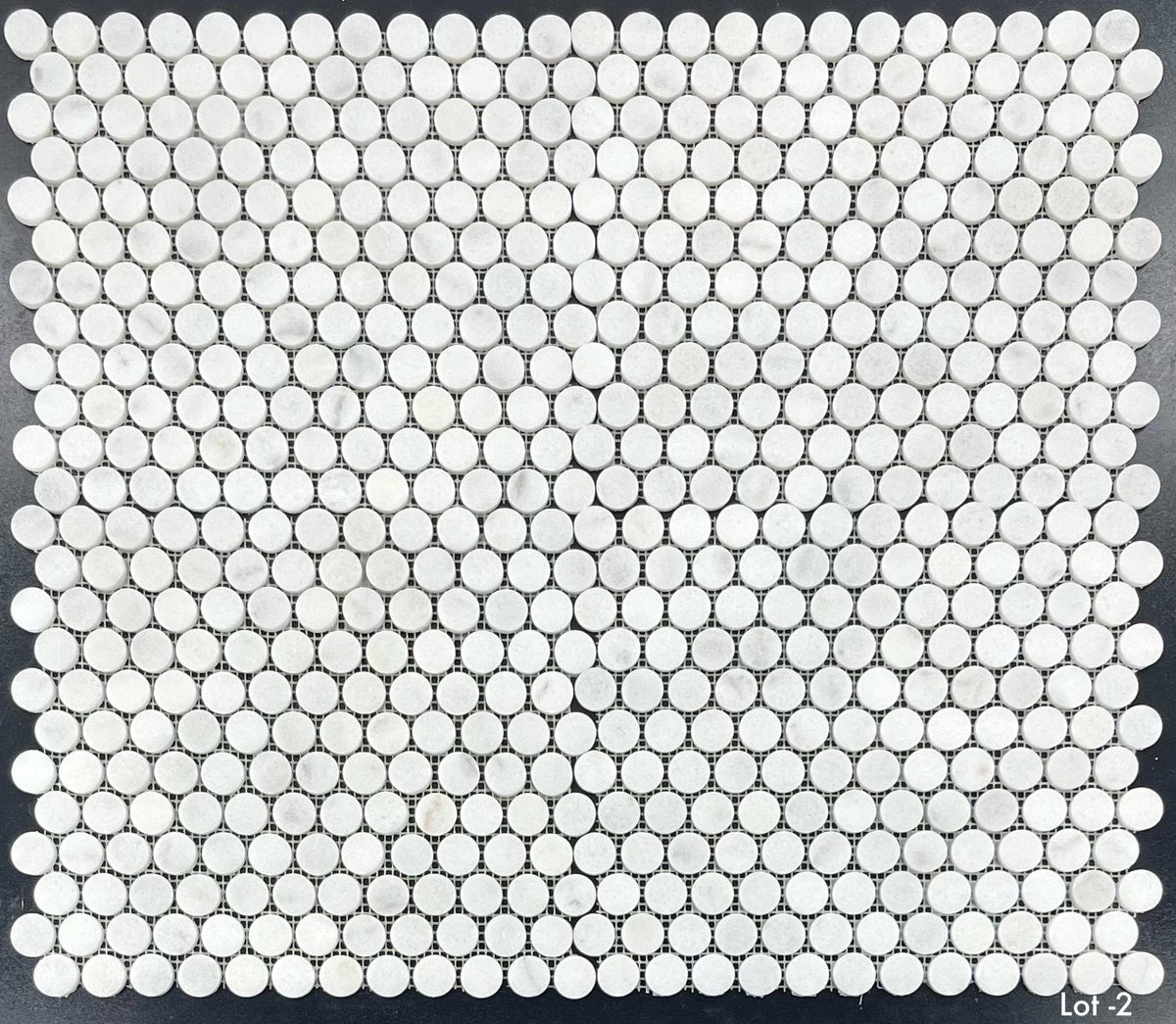 Elon Tile Rounds tile pattern swatch — available at Surface Group