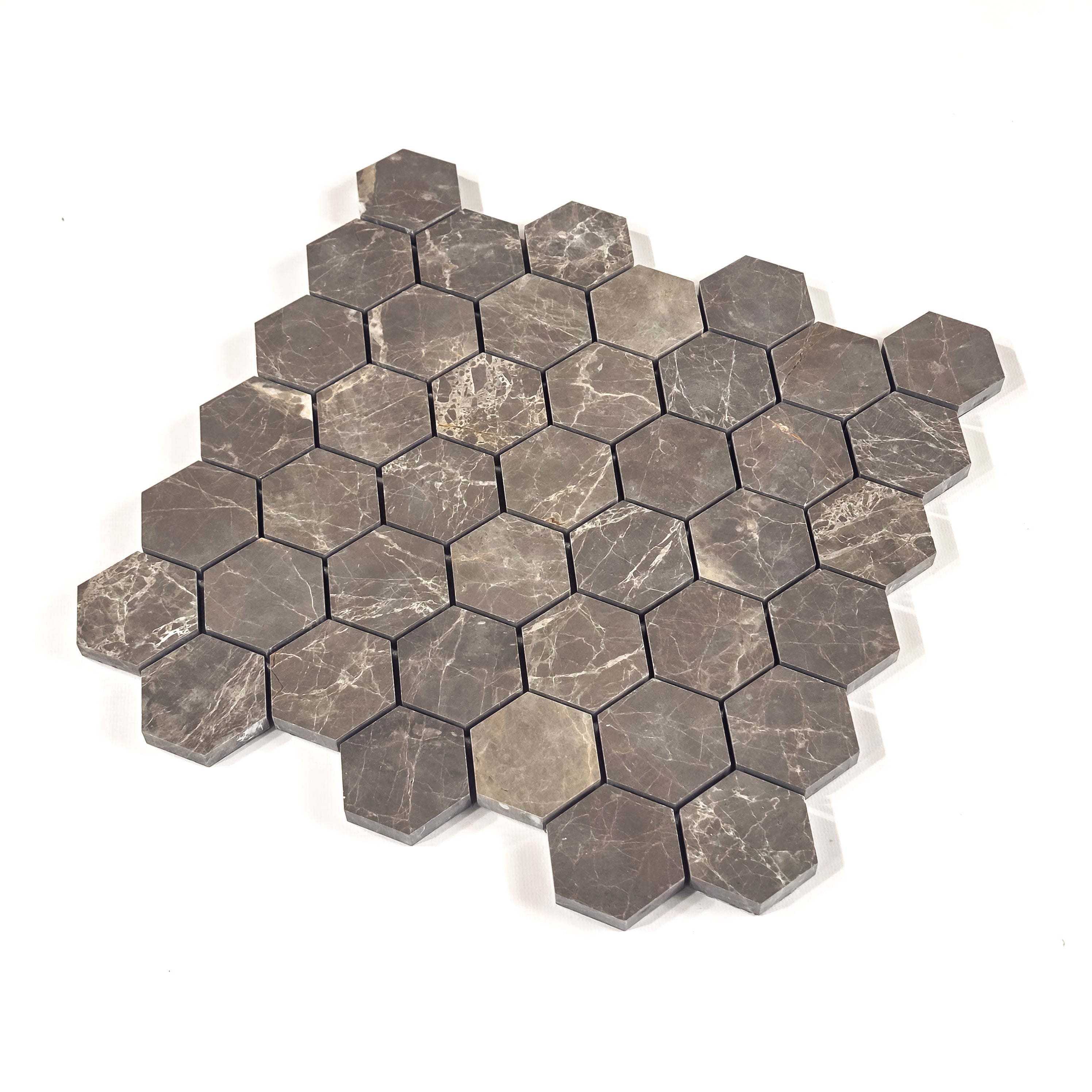 Elon Tile Hexagon tile close-up view — available at Surface Group