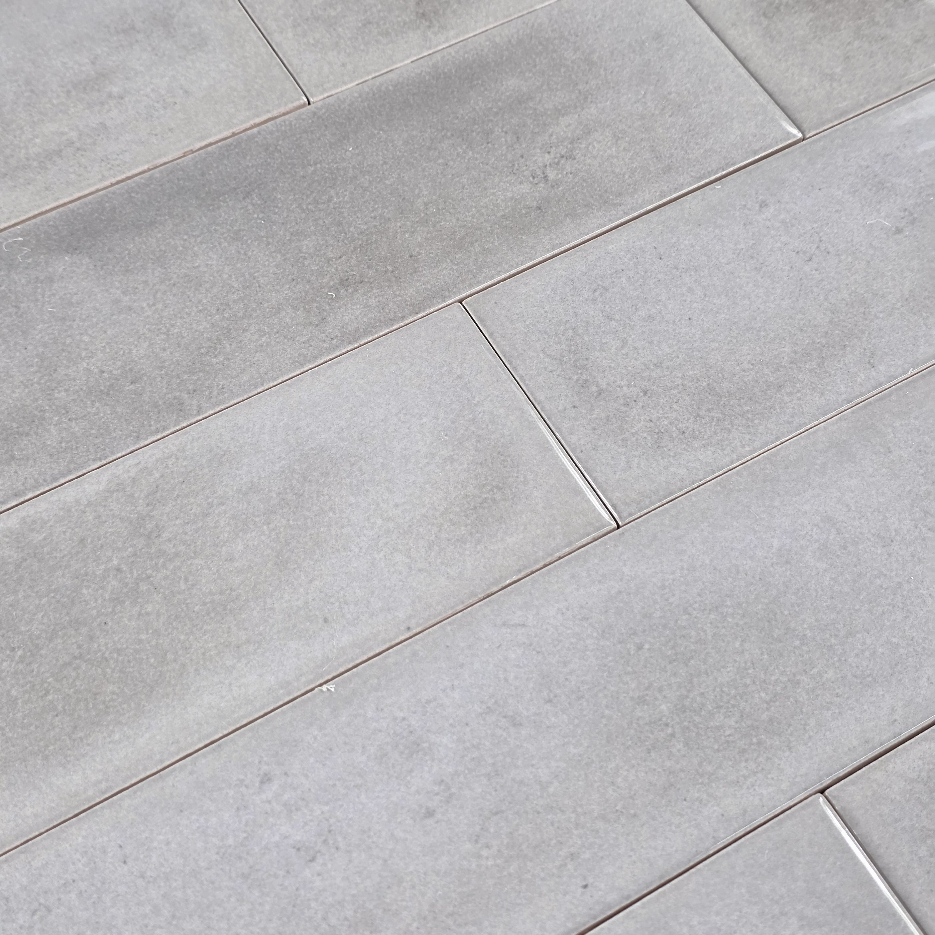 Elon Tile Opal Gray tile arrangement — available at Surface Group