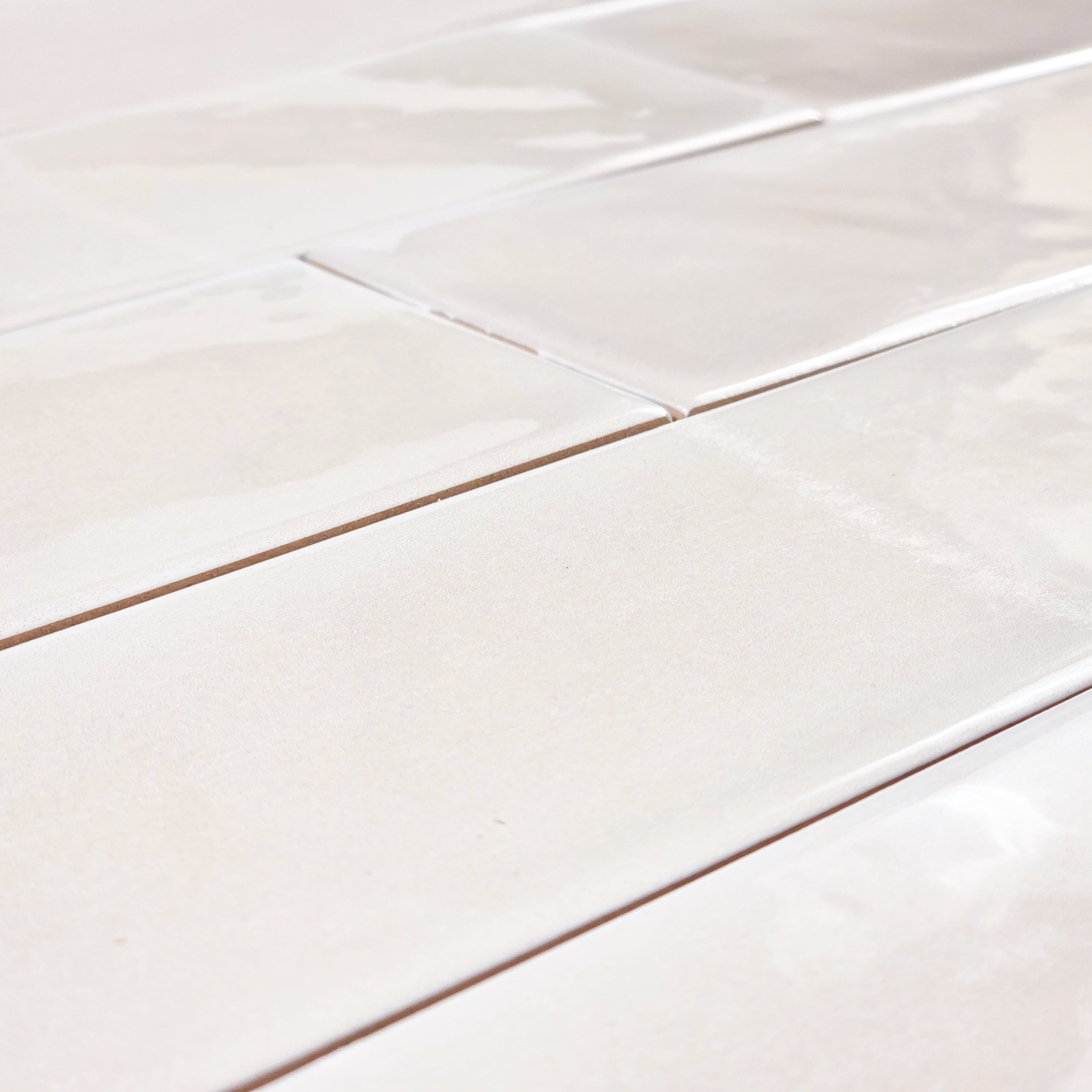 Elon Tile Opal Ivory tile arrangement — available at Surface Group
