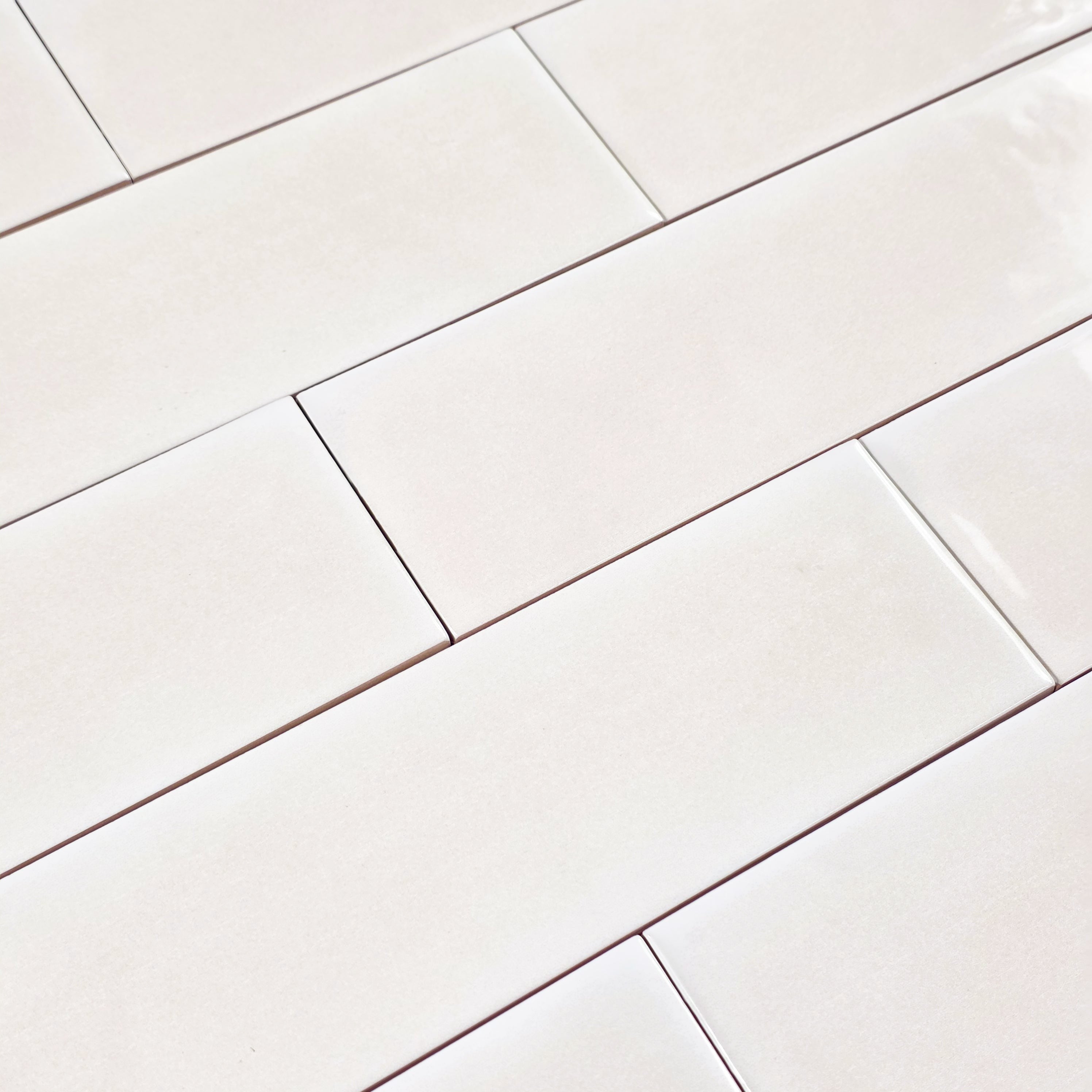 Elon Tile Opal Ivory tile arrangement — available at Surface Group