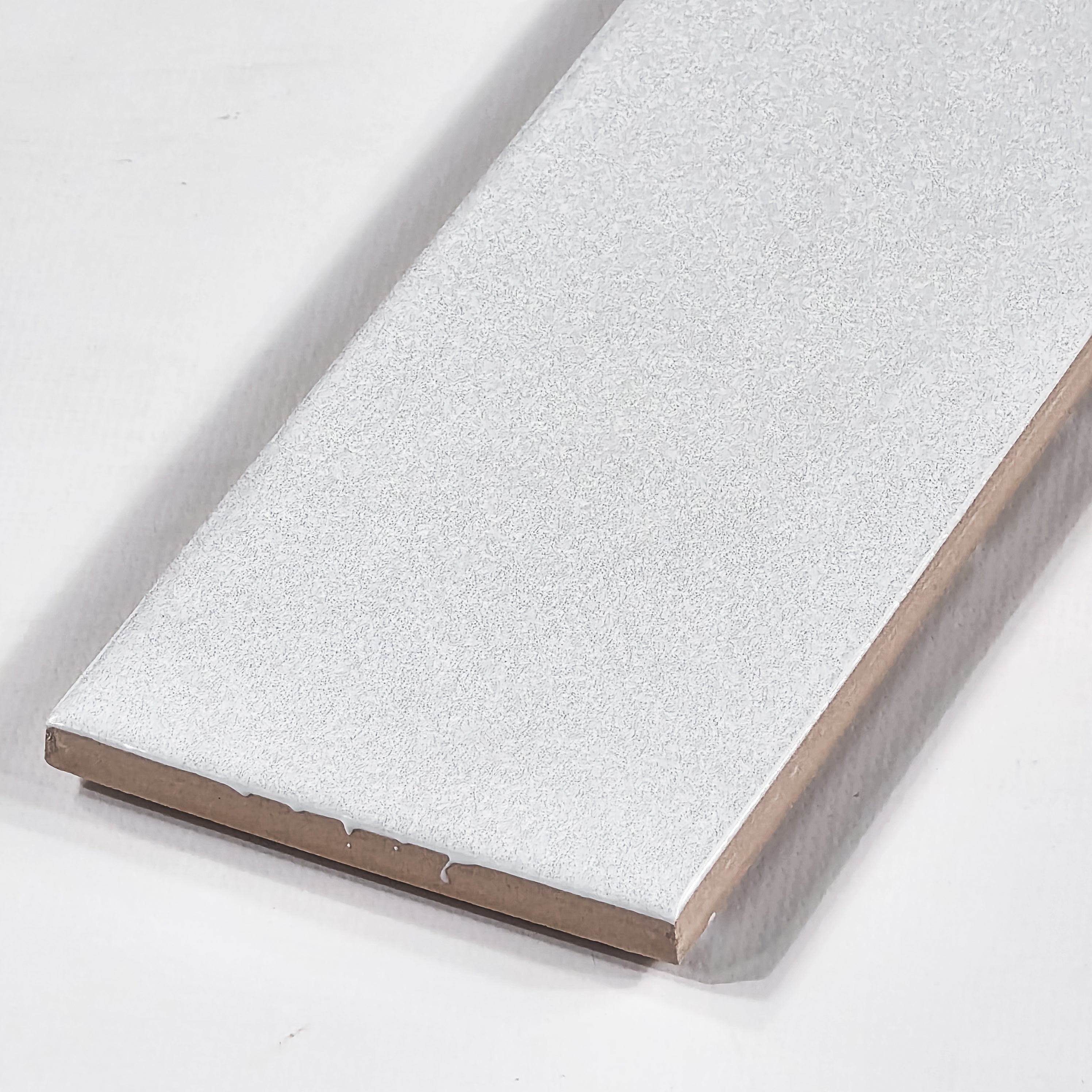Elon Tile Opal White tile close-up view — available at Surface Group