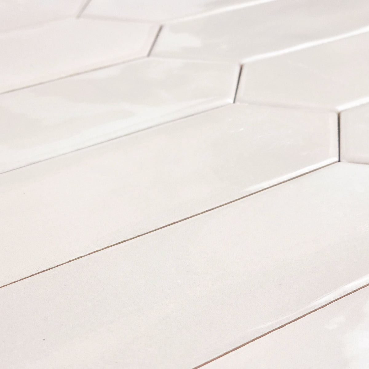 Elon Tile Optics Beige tile arrangement — available at Surface Group