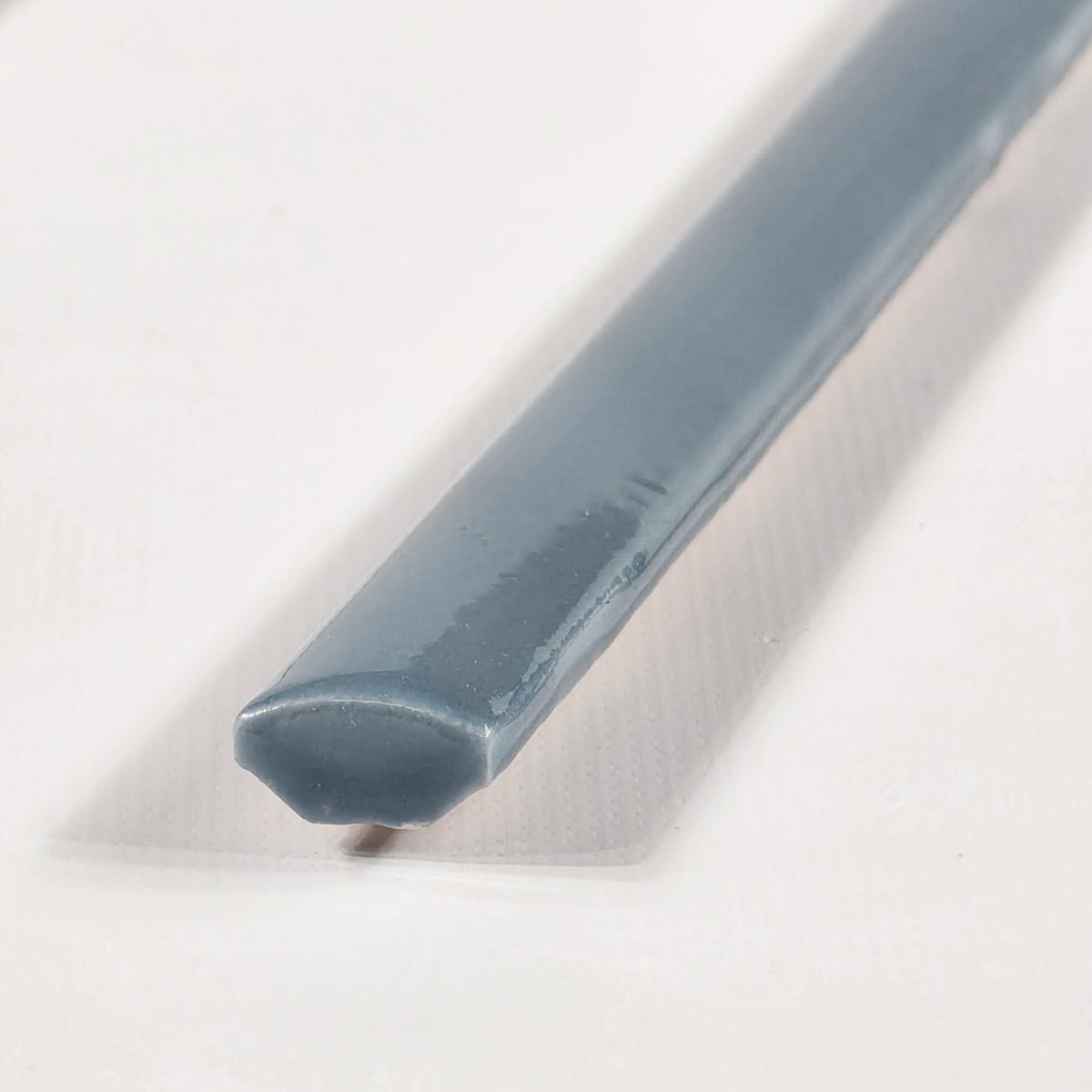 Elon Tile Optics Marine tile close-up view — available at Surface Group
