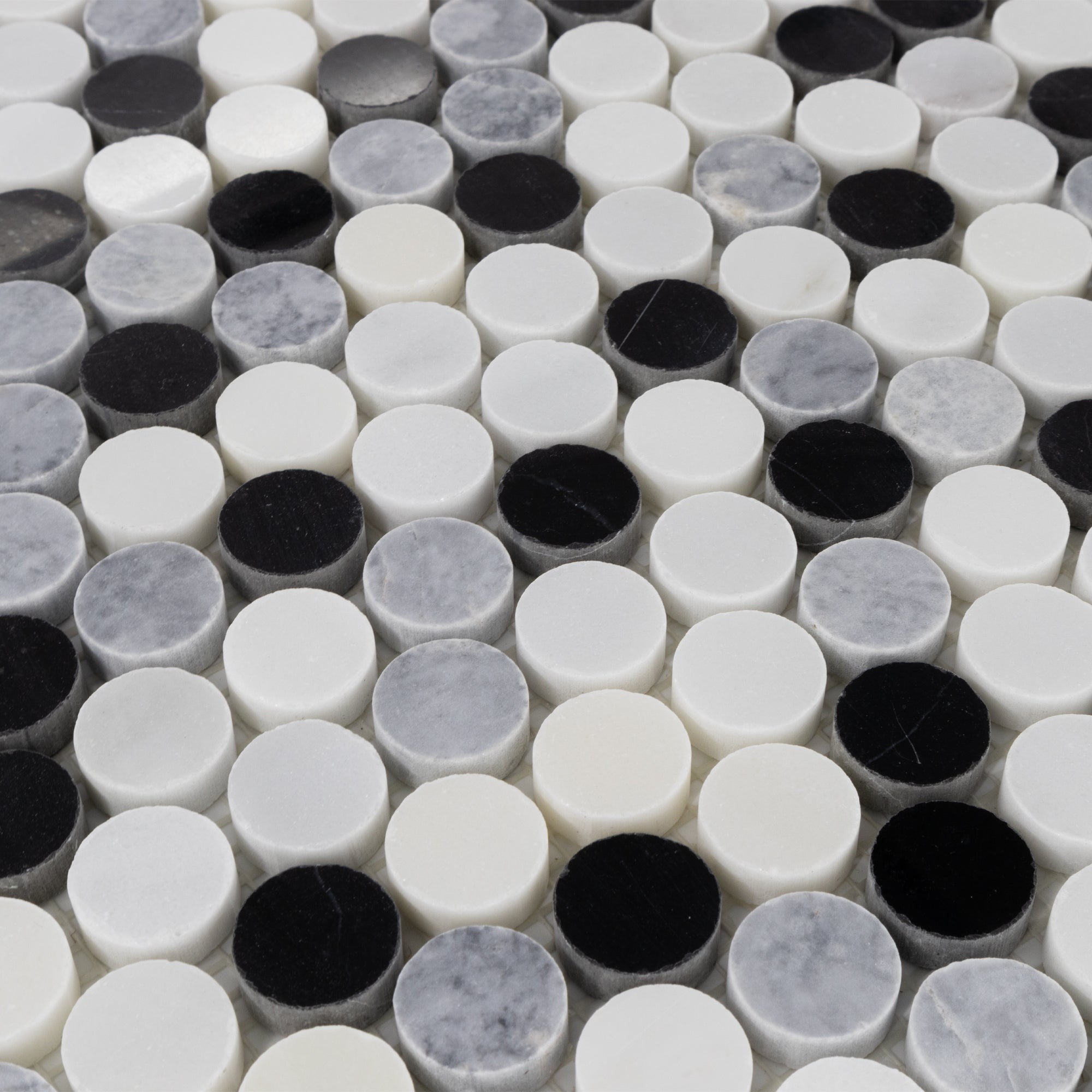Elon Tile Rounds tile arrangement — available at Surface Group