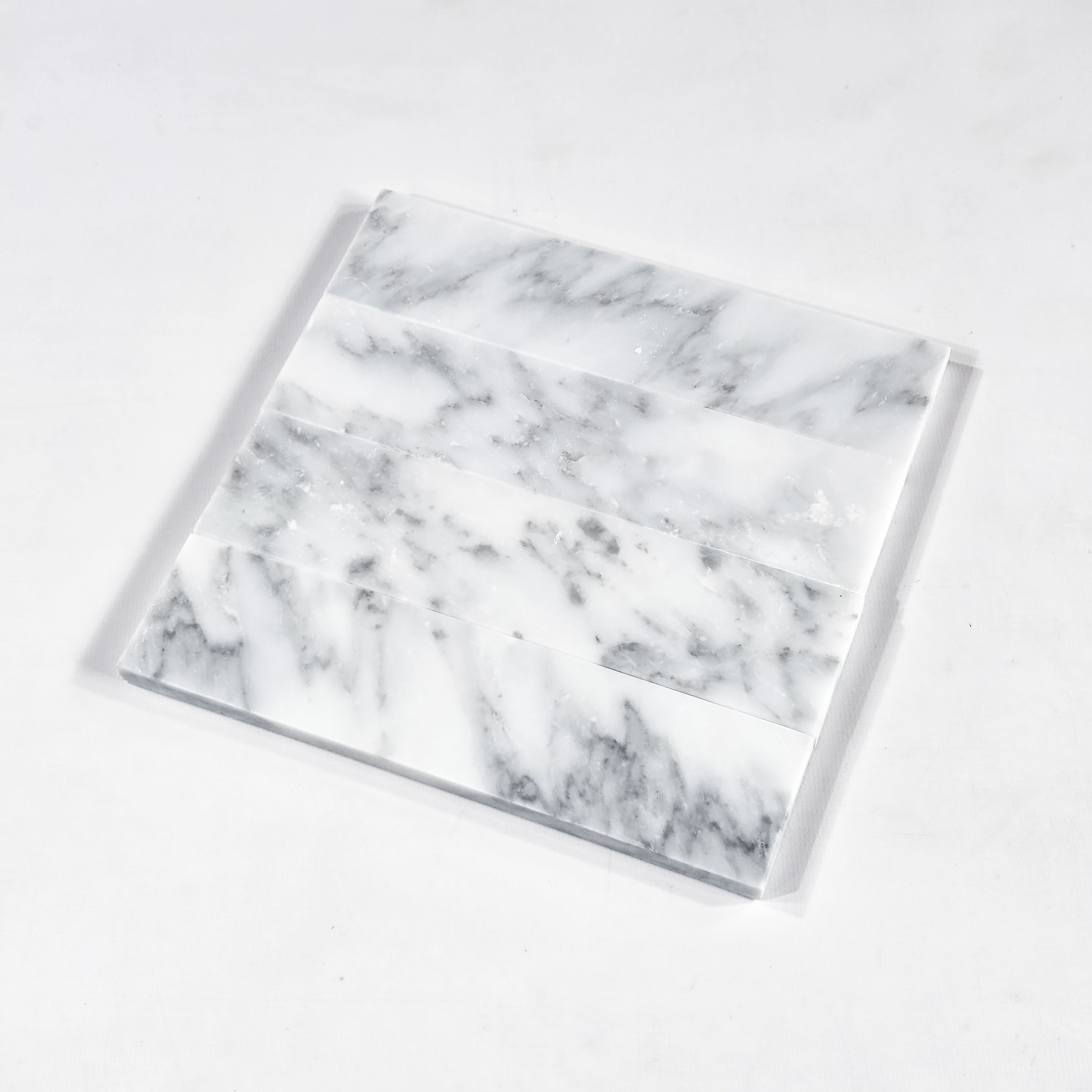 Elon Tile Pearl White Field Tile tile arrangement — available at Surface Group