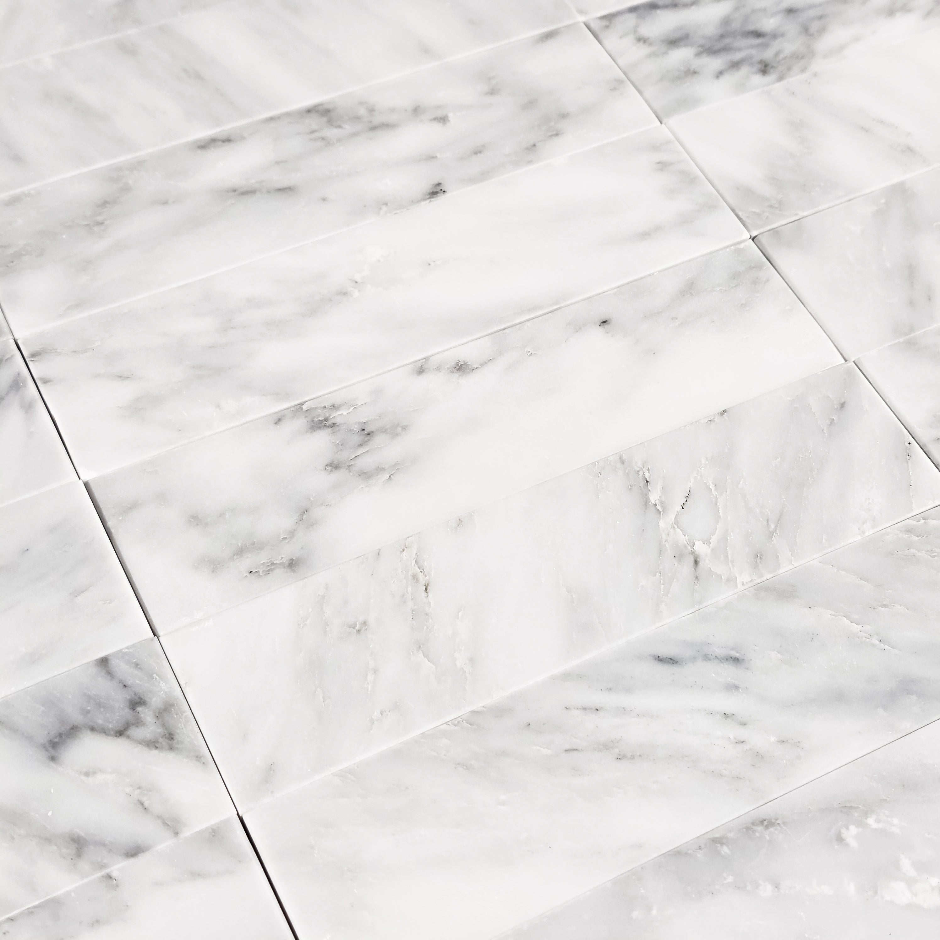 Elon Tile Pearl White Field Tile tile arrangement — available at Surface Group