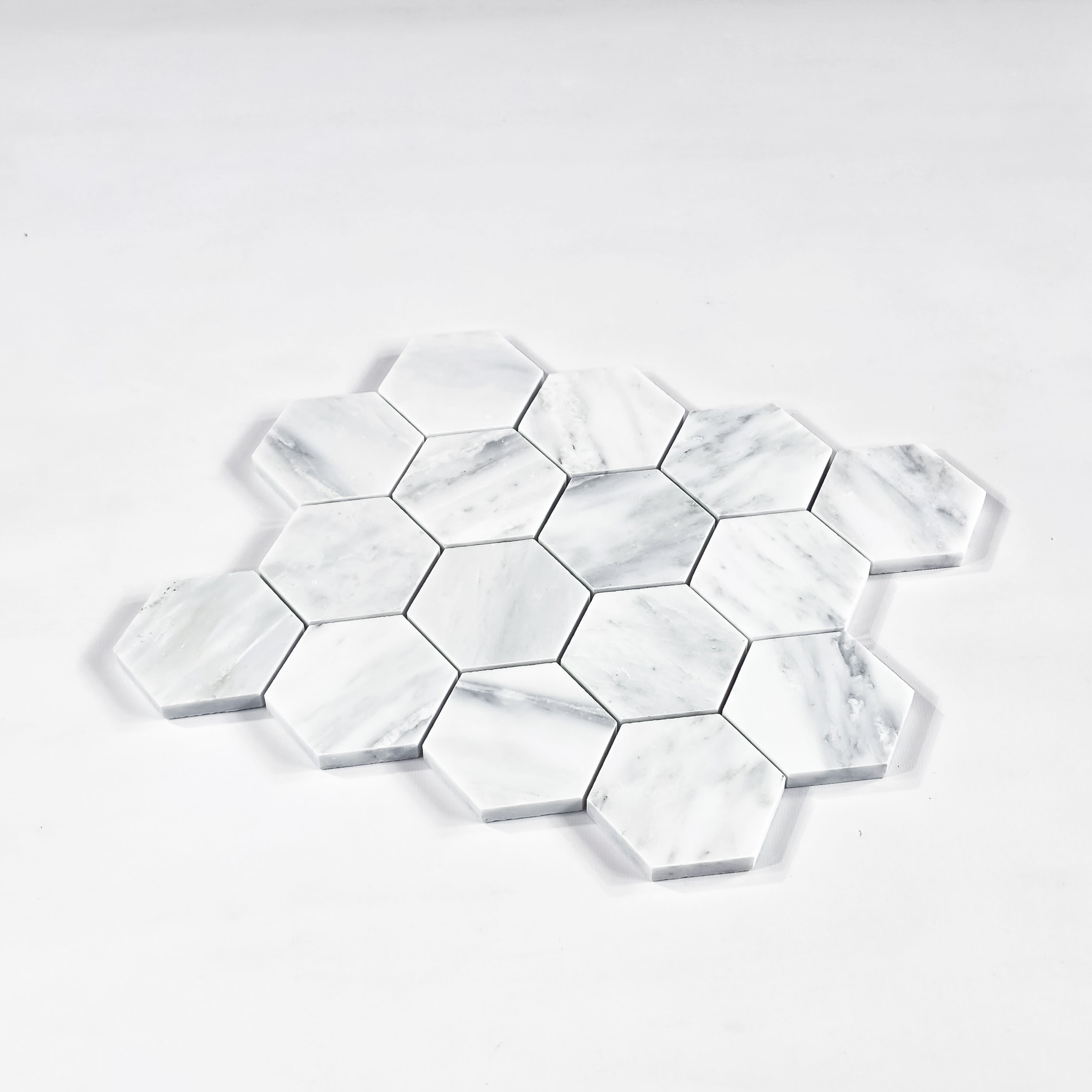 Elon Tile Hexagon tile close-up view — available at Surface Group