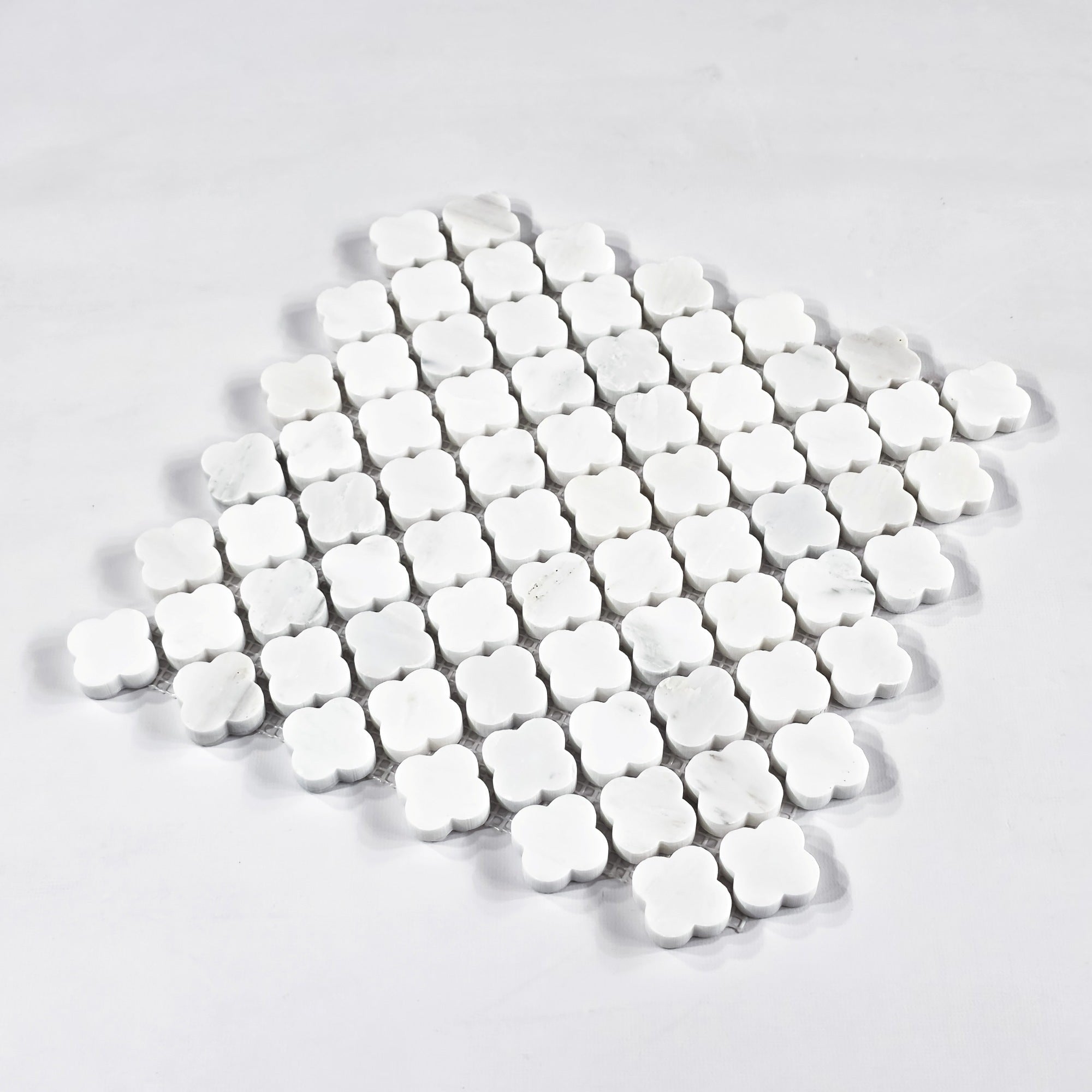 Elon Tile Clover tile close-up view — available at Surface Group