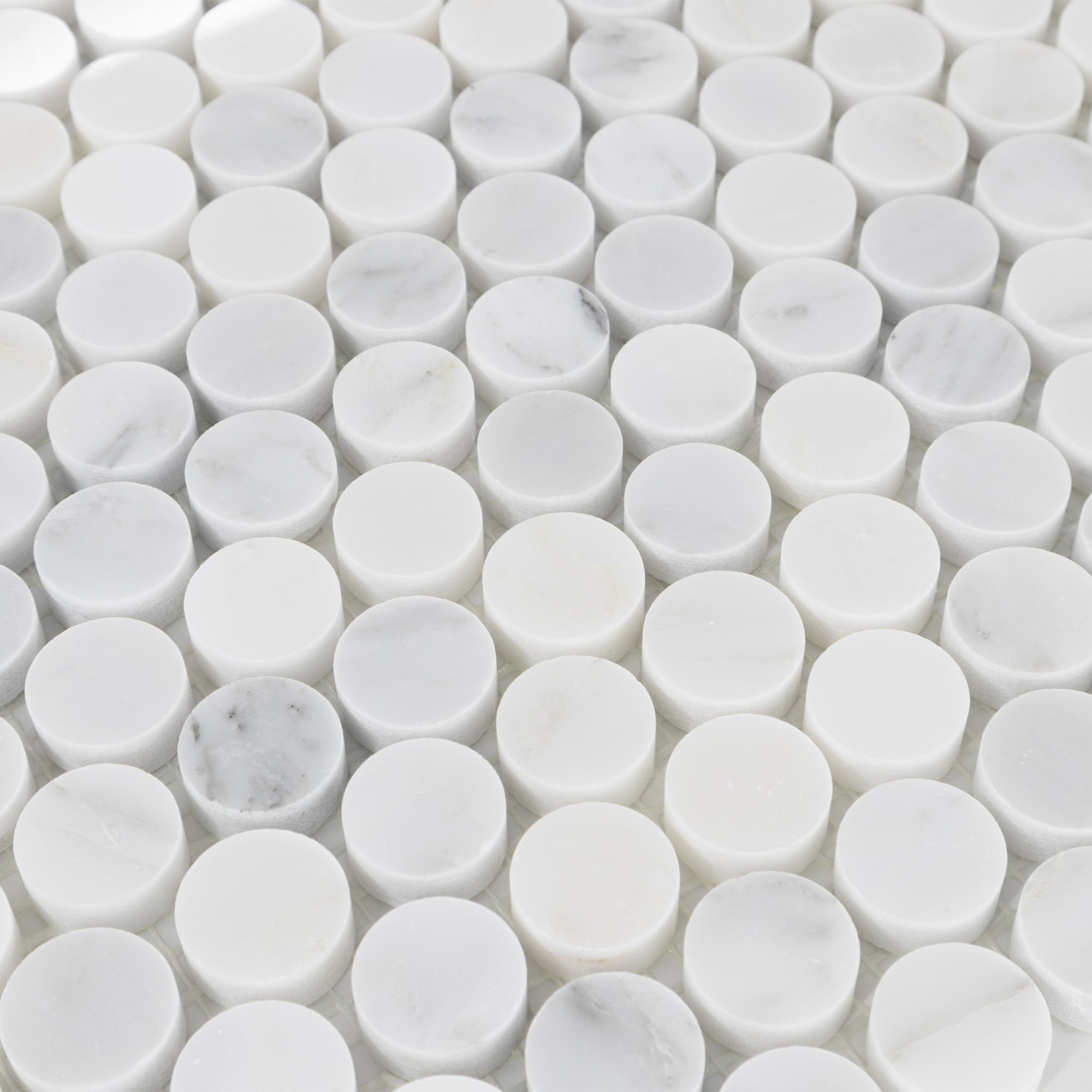 Elon Tile Rounds tile arrangement — available at Surface Group