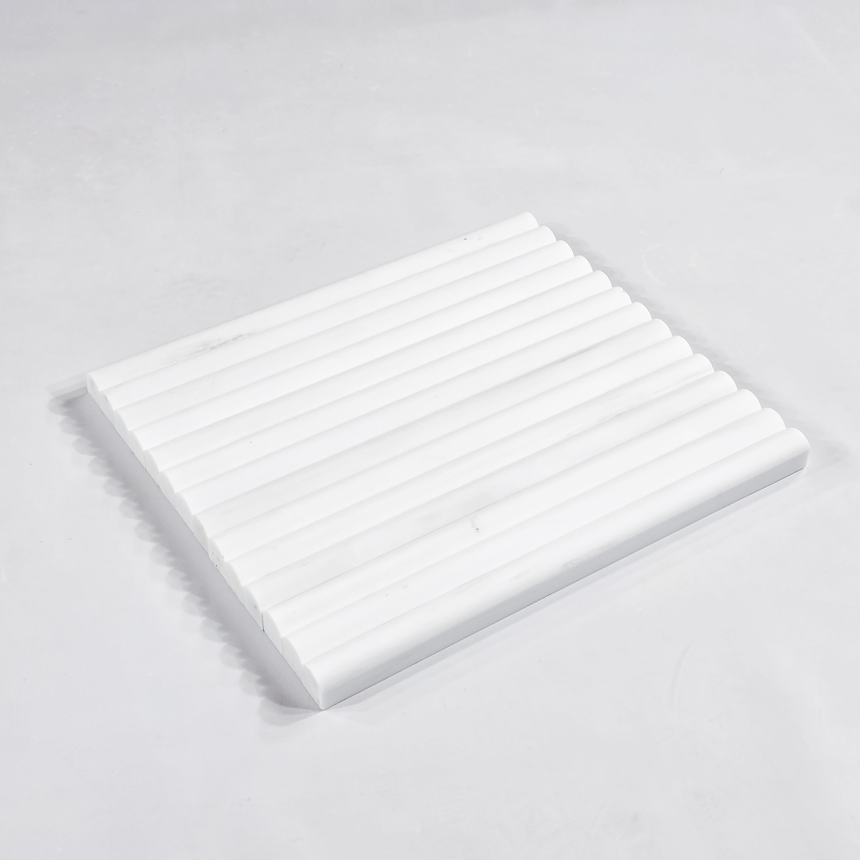 Elon Tile Pencil tile arrangement — available at Surface Group