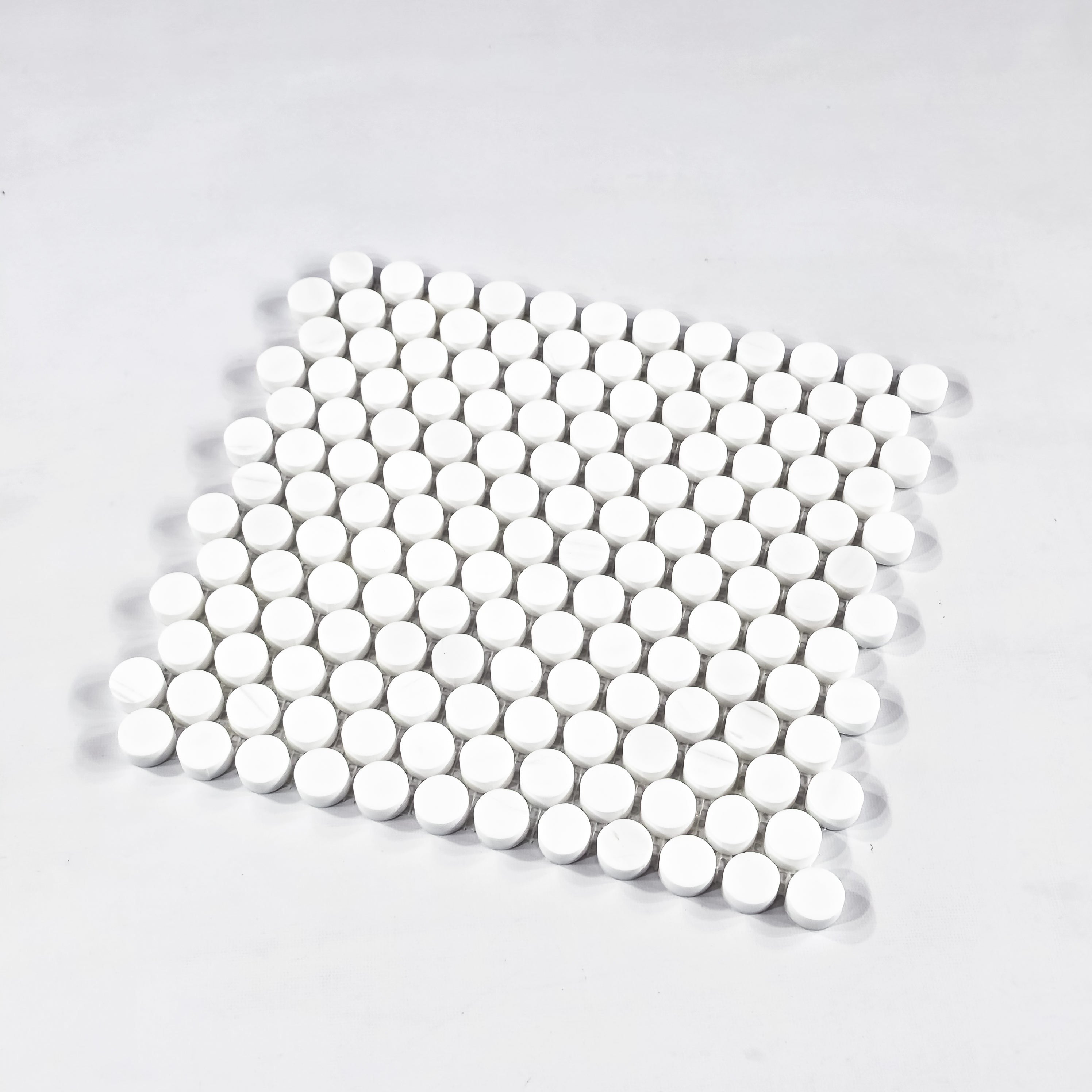 Elon Tile Rounds tile close-up view — available at Surface Group