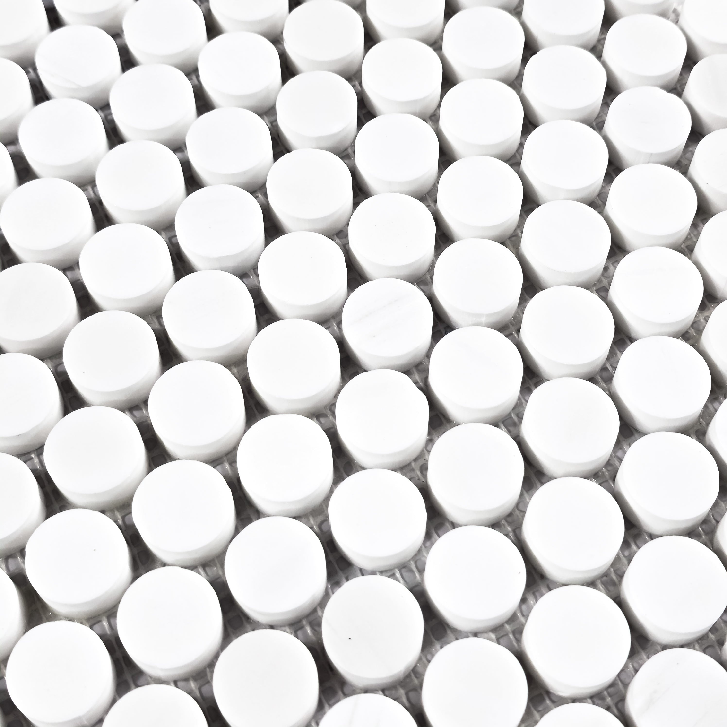 Elon Tile Rounds tile arrangement — available at Surface Group