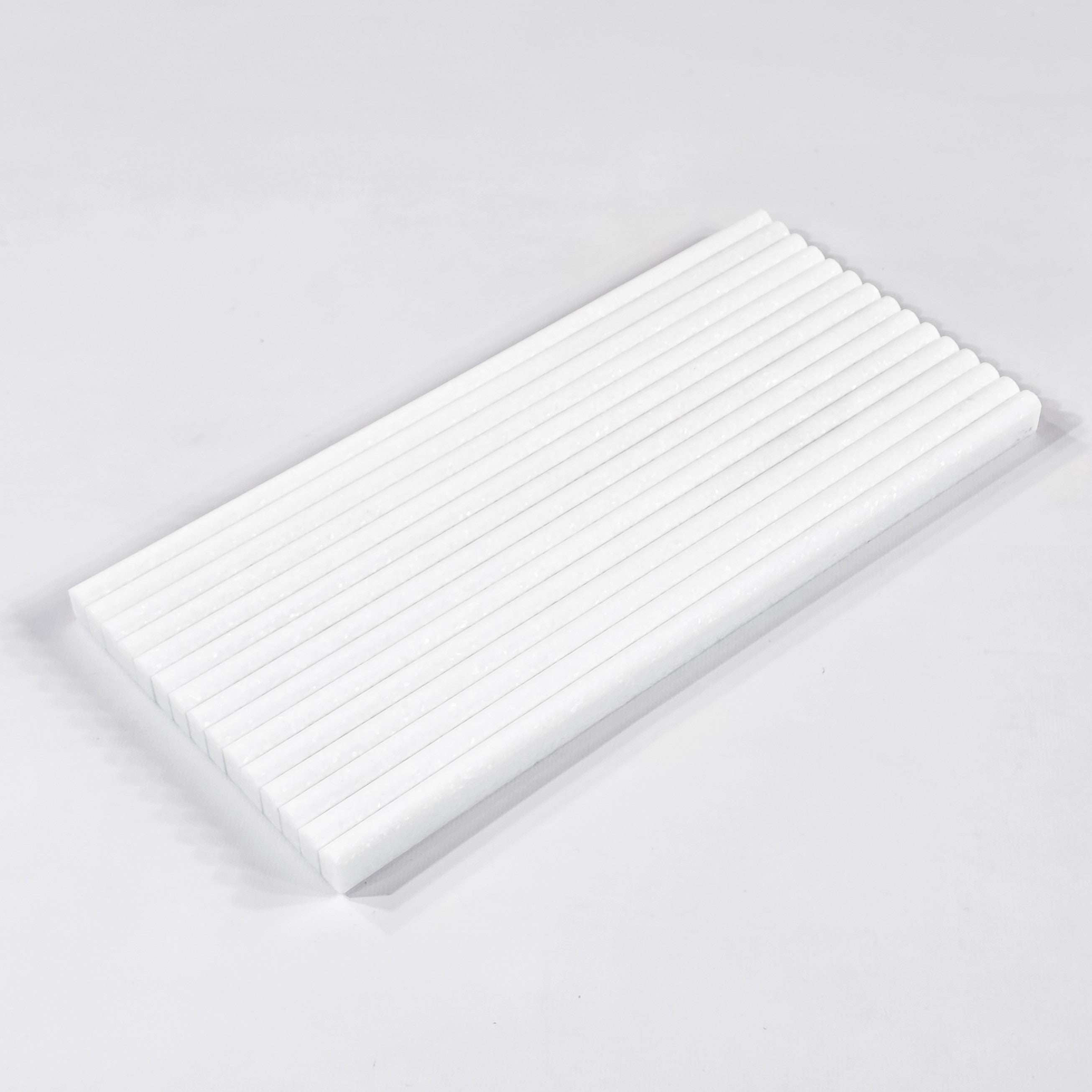 Elon Tile Pencil tile arrangement — available at Surface Group