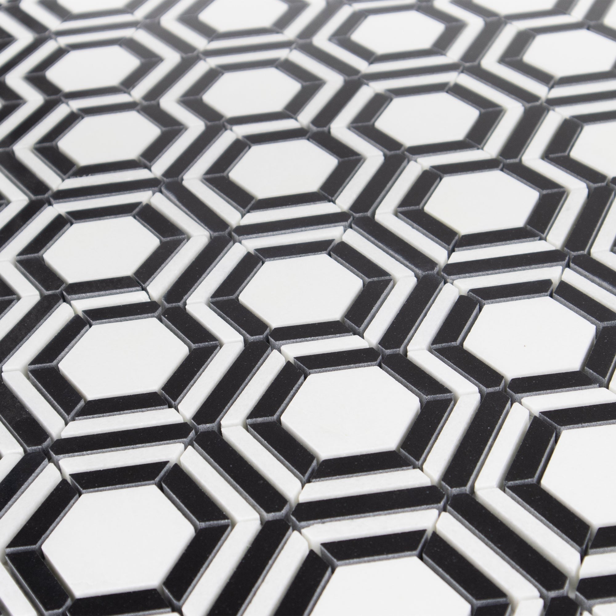 Elon Tile White Thassos Mosaic tile arrangement — available at Surface Group