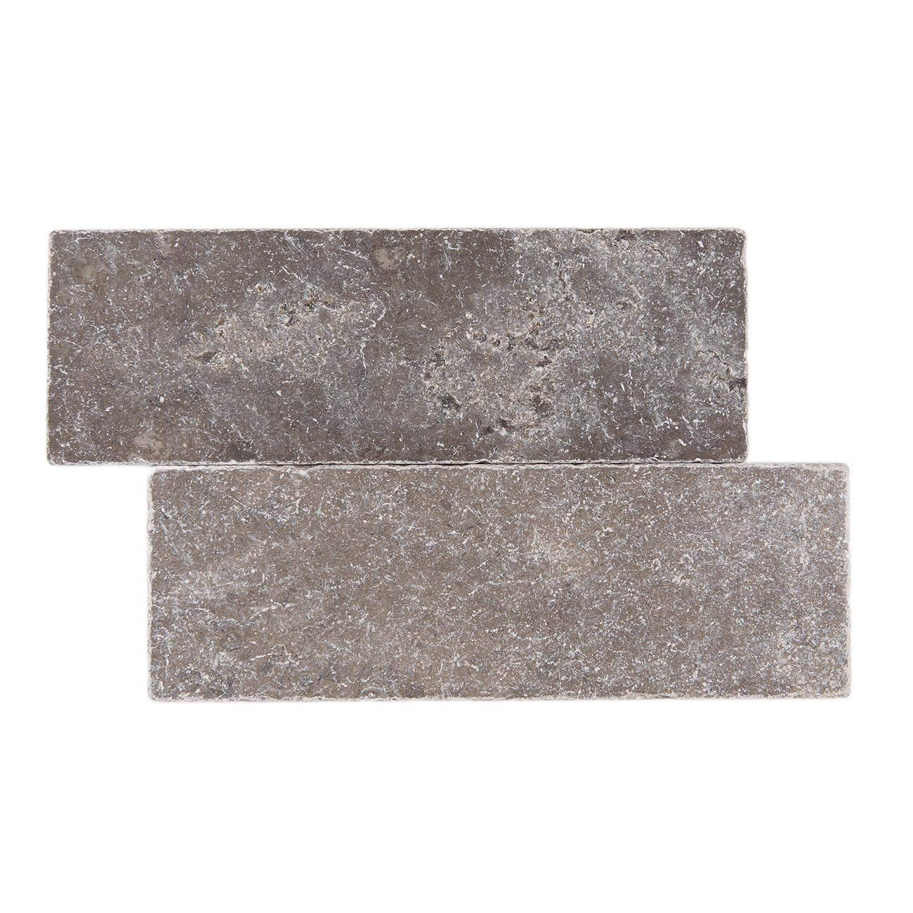 Heather Grey limestone field tiles with tumbled finish and worn edge, 3x9x0.375 inches