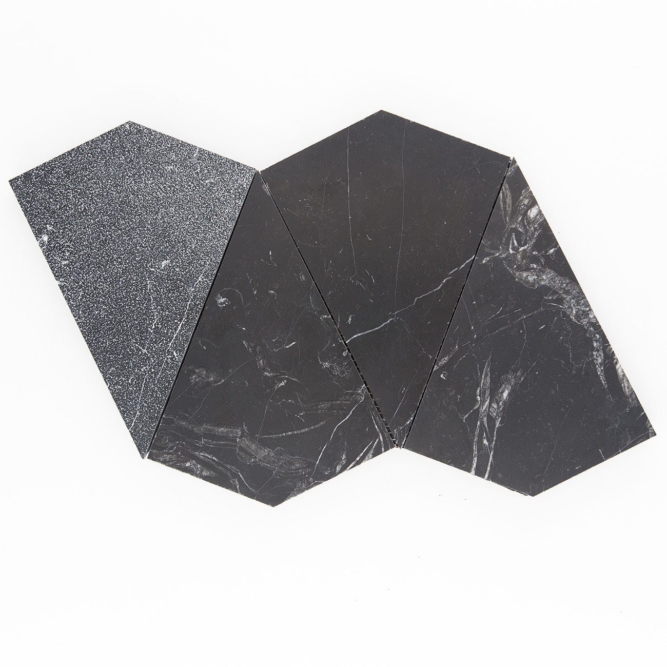 Nero Marquina marble mosaic with arrowhead pattern, honed and sandblasted finish, ideal for flooring and countertops.