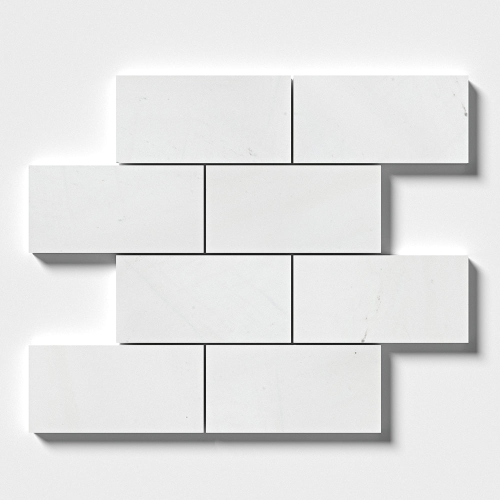 Marble Systems Aspen White Honed Marble Aspen White matte marble tile pattern swatch — available at Surface Group