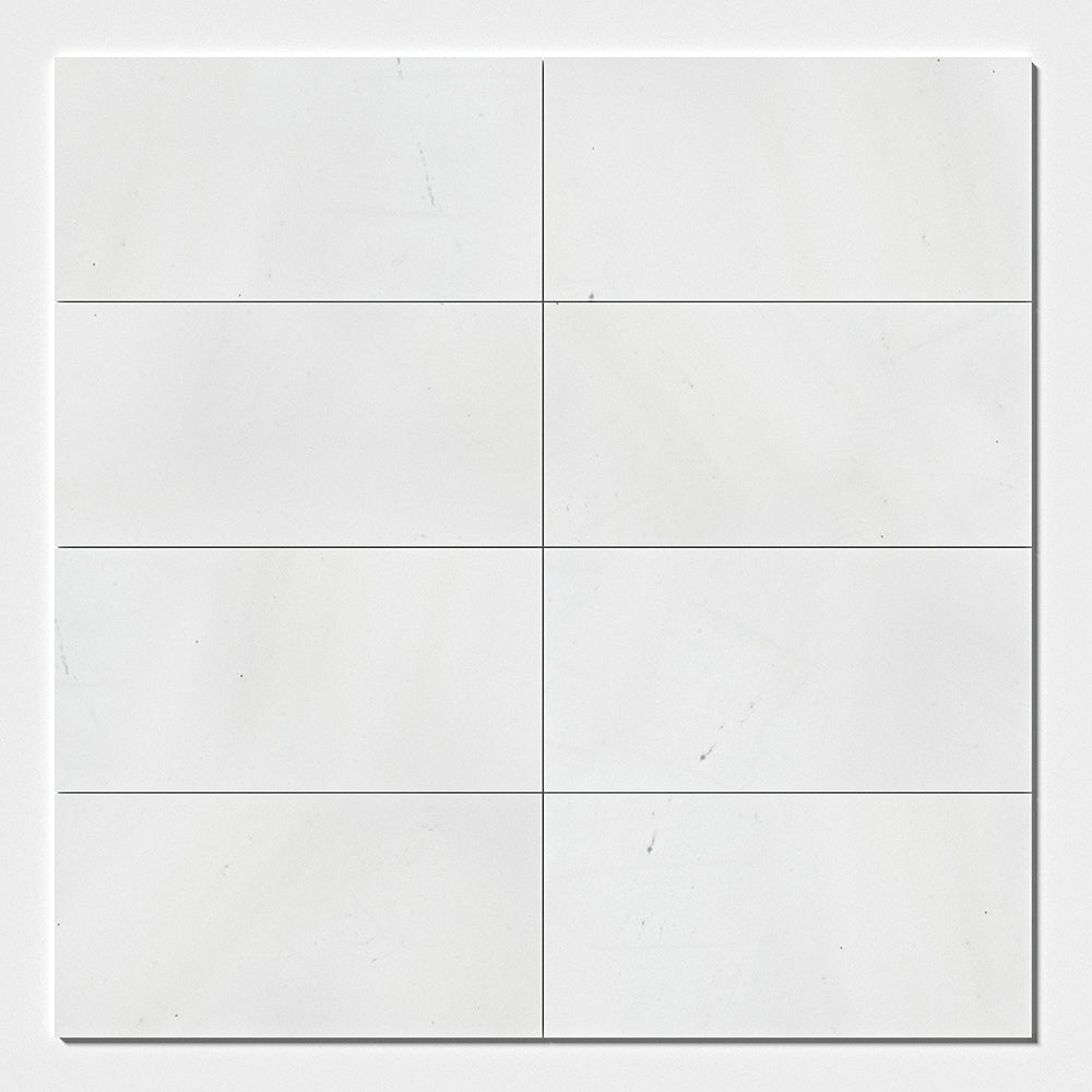 Marble Systems Aspen White Polished Marble Aspen White glossy marble tile pattern swatch — available at Surface Group